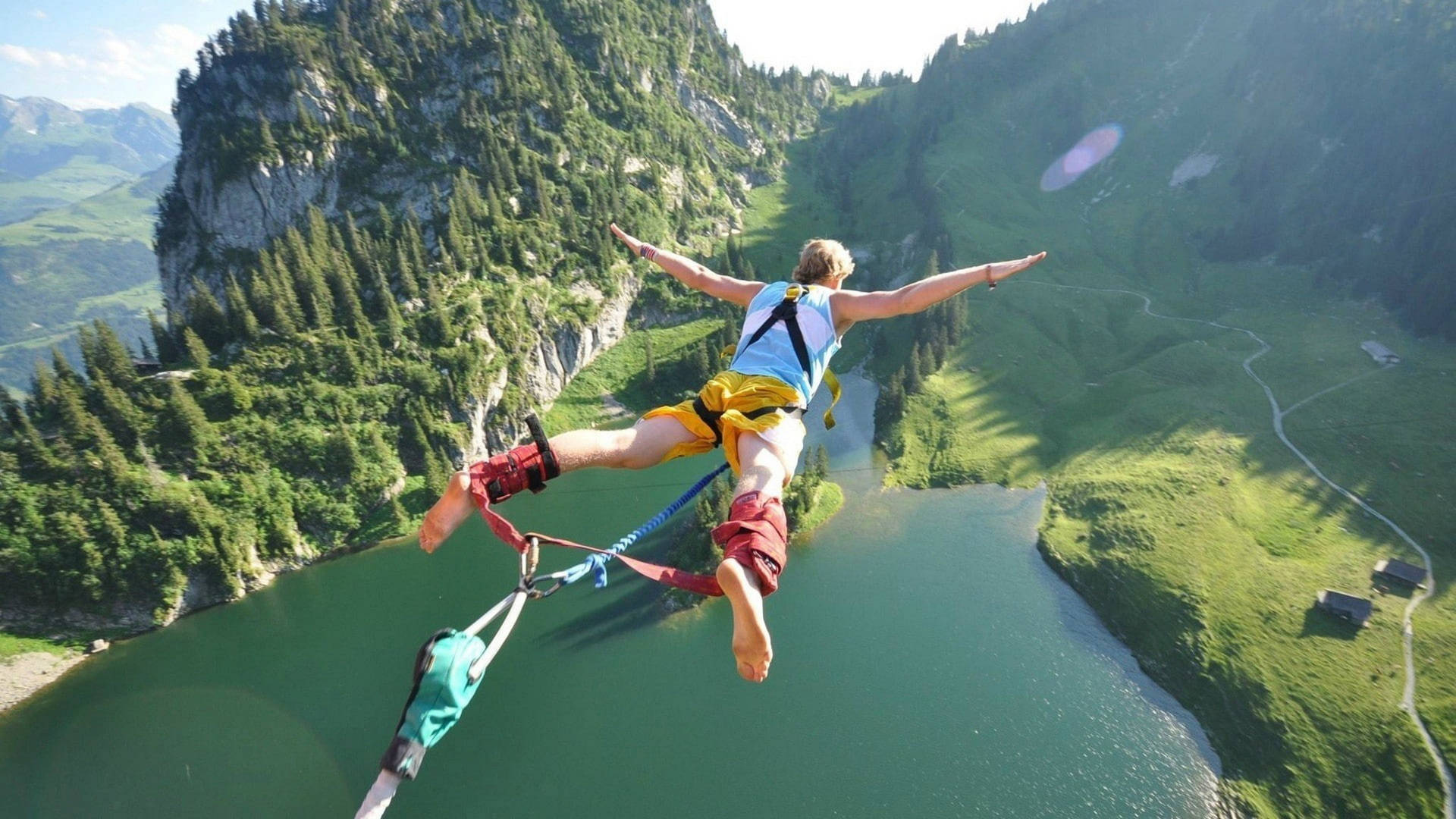 Captivating Leap Of Faith In Extreme Sports: Bungee Jumping Background