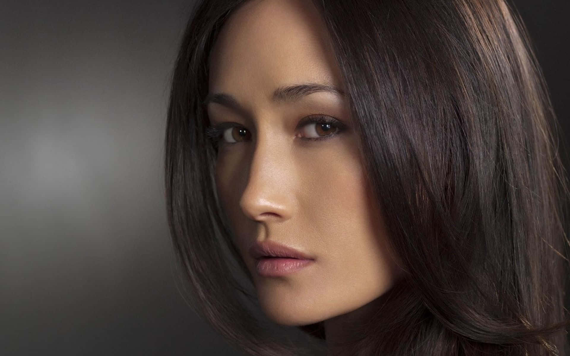 Captivating Maggie Q Portrait Background