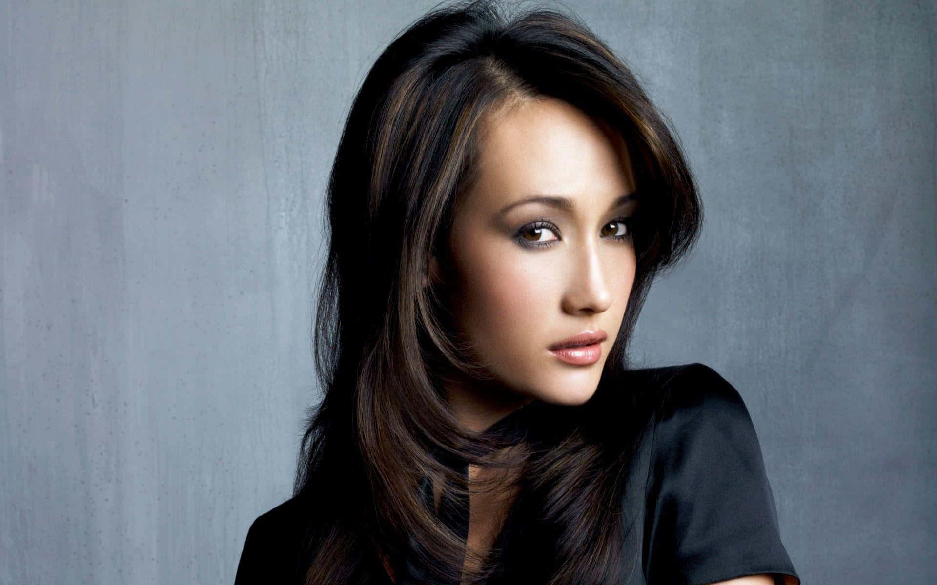 Captivating Maggie Q Wallpaper Background