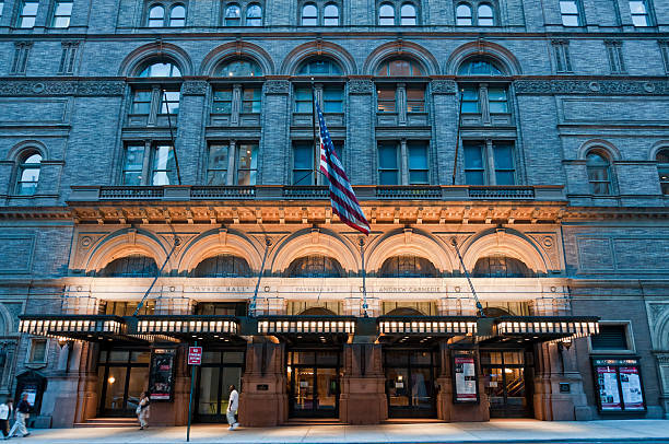 Captivating Night View Of Carnegie Hall, New York Background