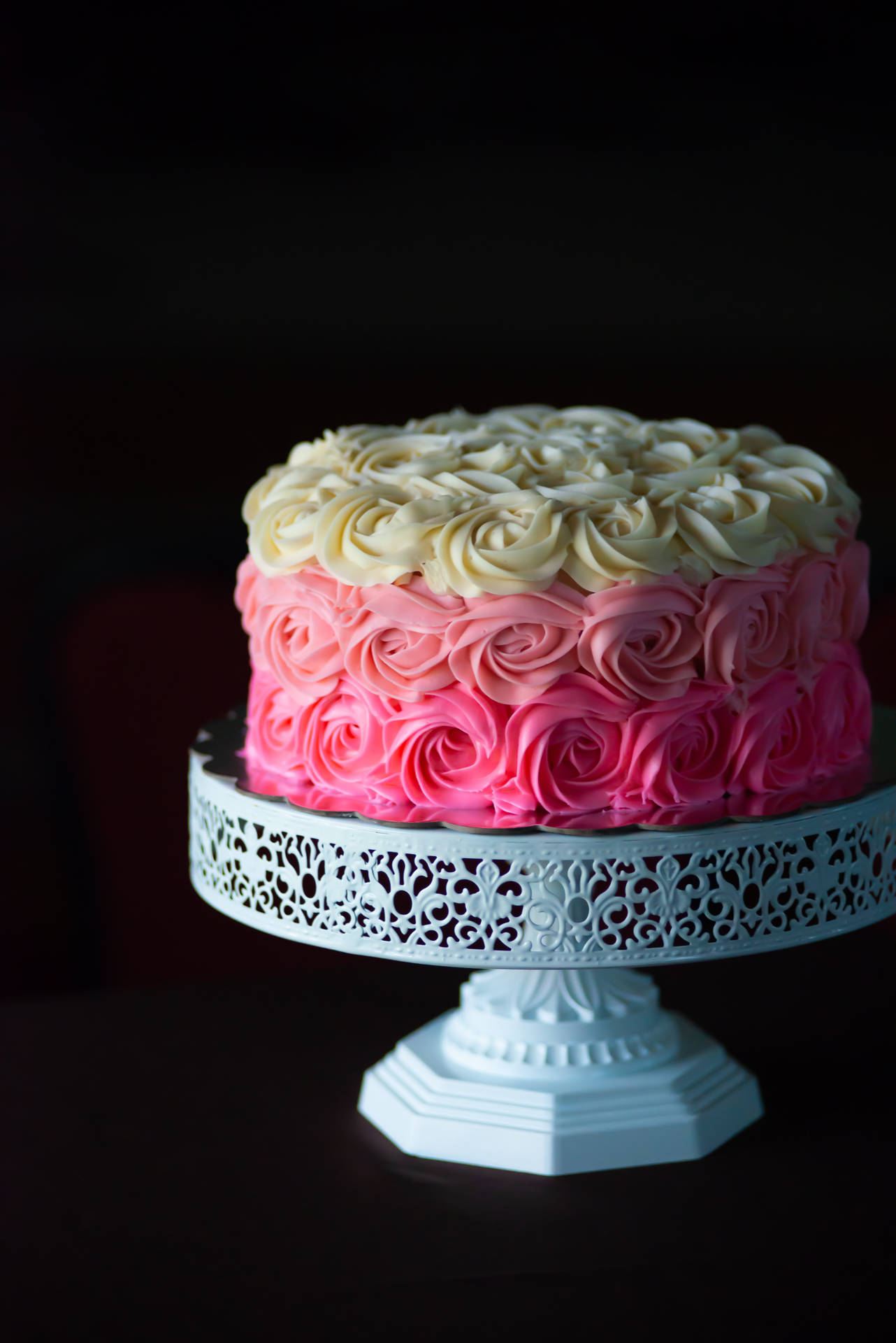 Captivating Pink And White Rosette Cake Background
