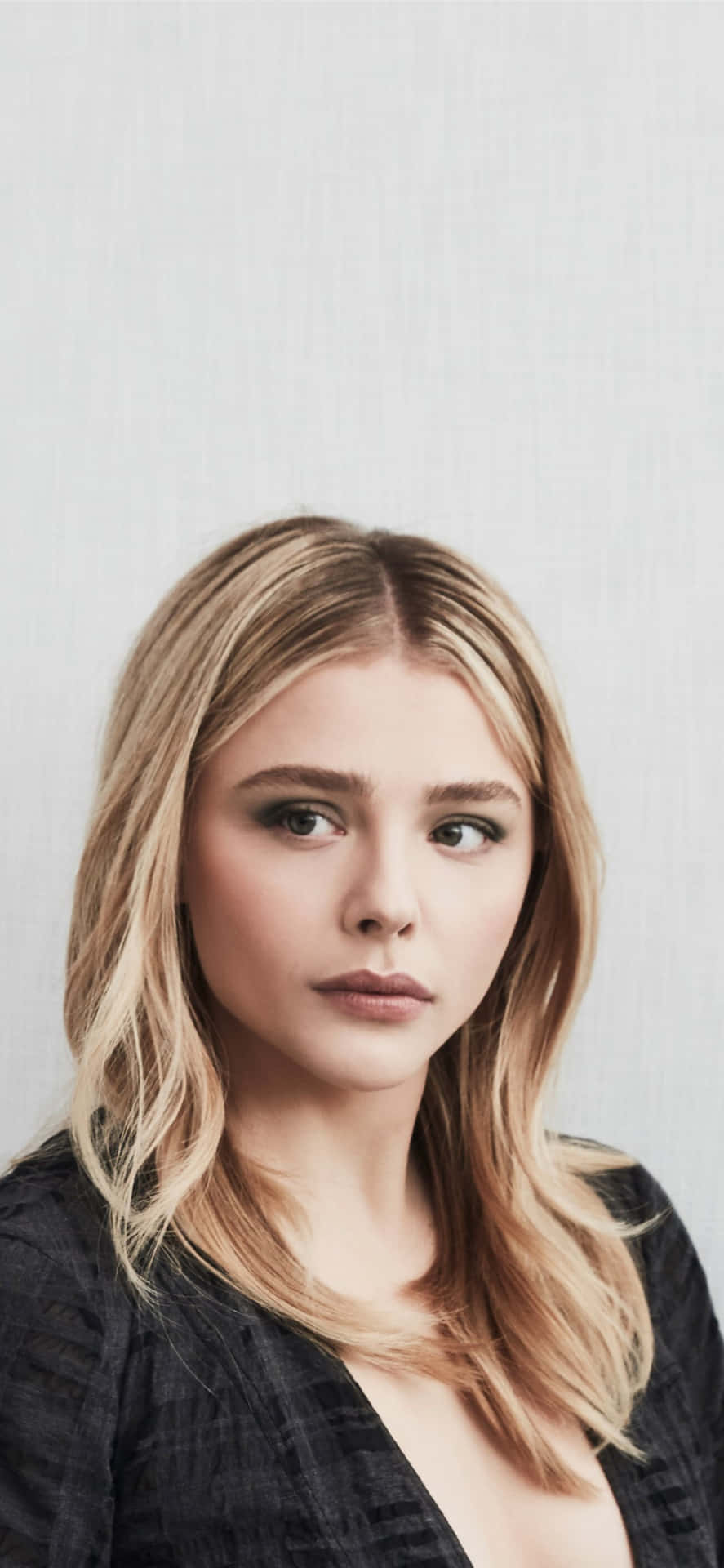 Captivating Portrait Photography Of American Actress Chloe Grace Moretz Background