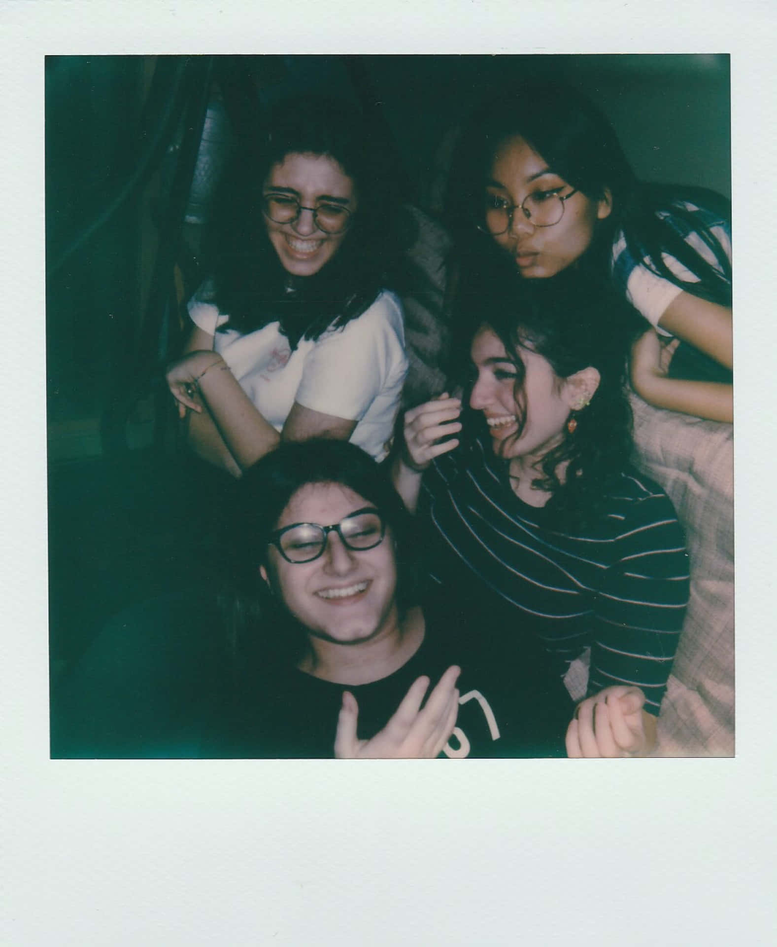 Captivating Retro Aesthetic Of Mature Teenagers With A Polaroid.