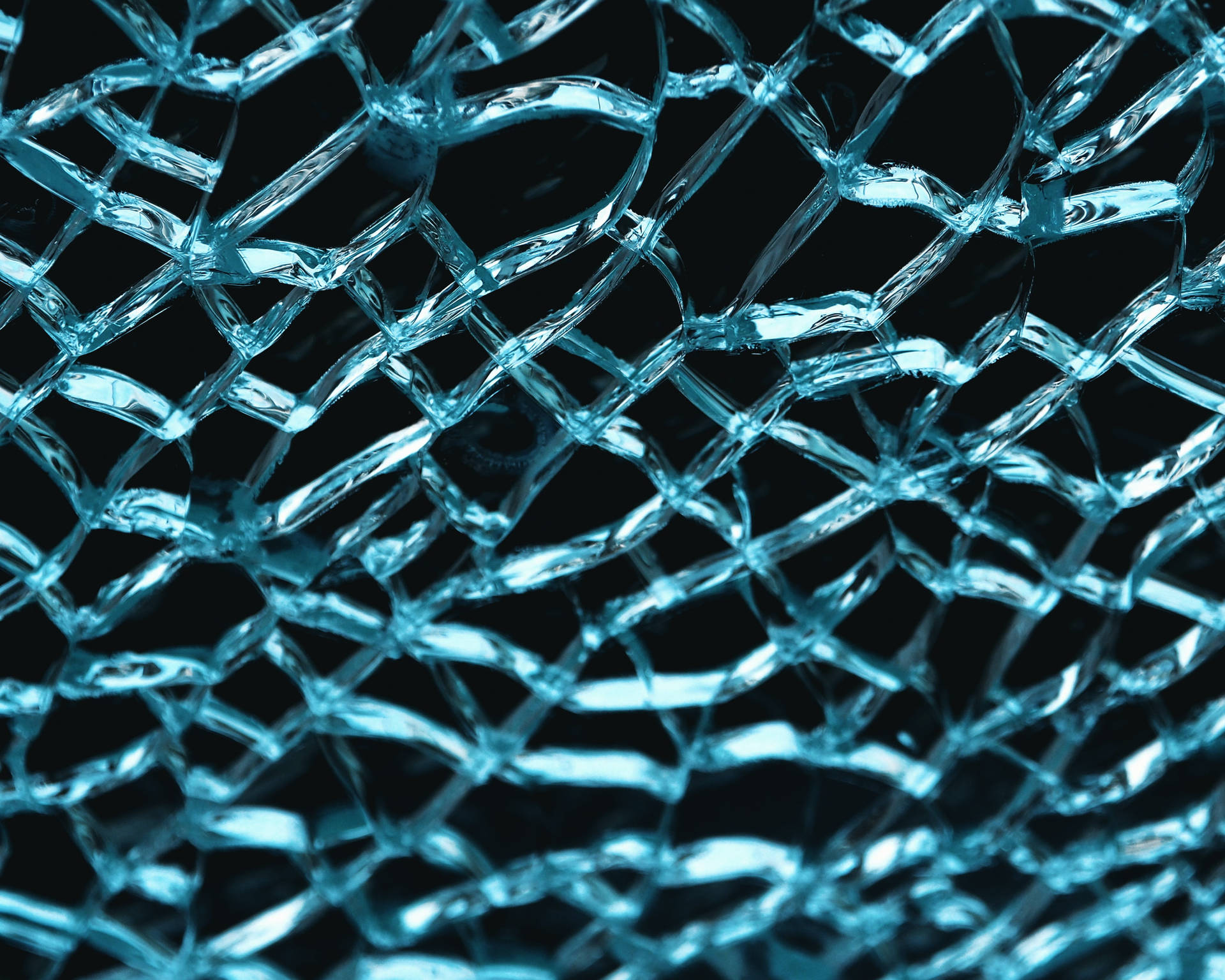 Captivating Shatter: Patterns In Broken Glass Background