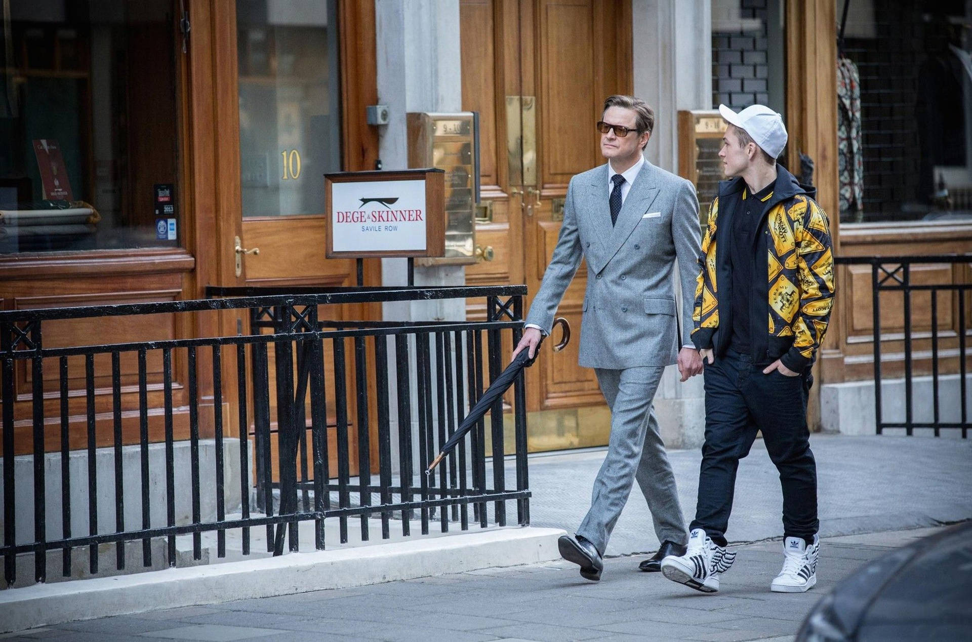 Captivating Shot Of Kingsman Agents In Action Background