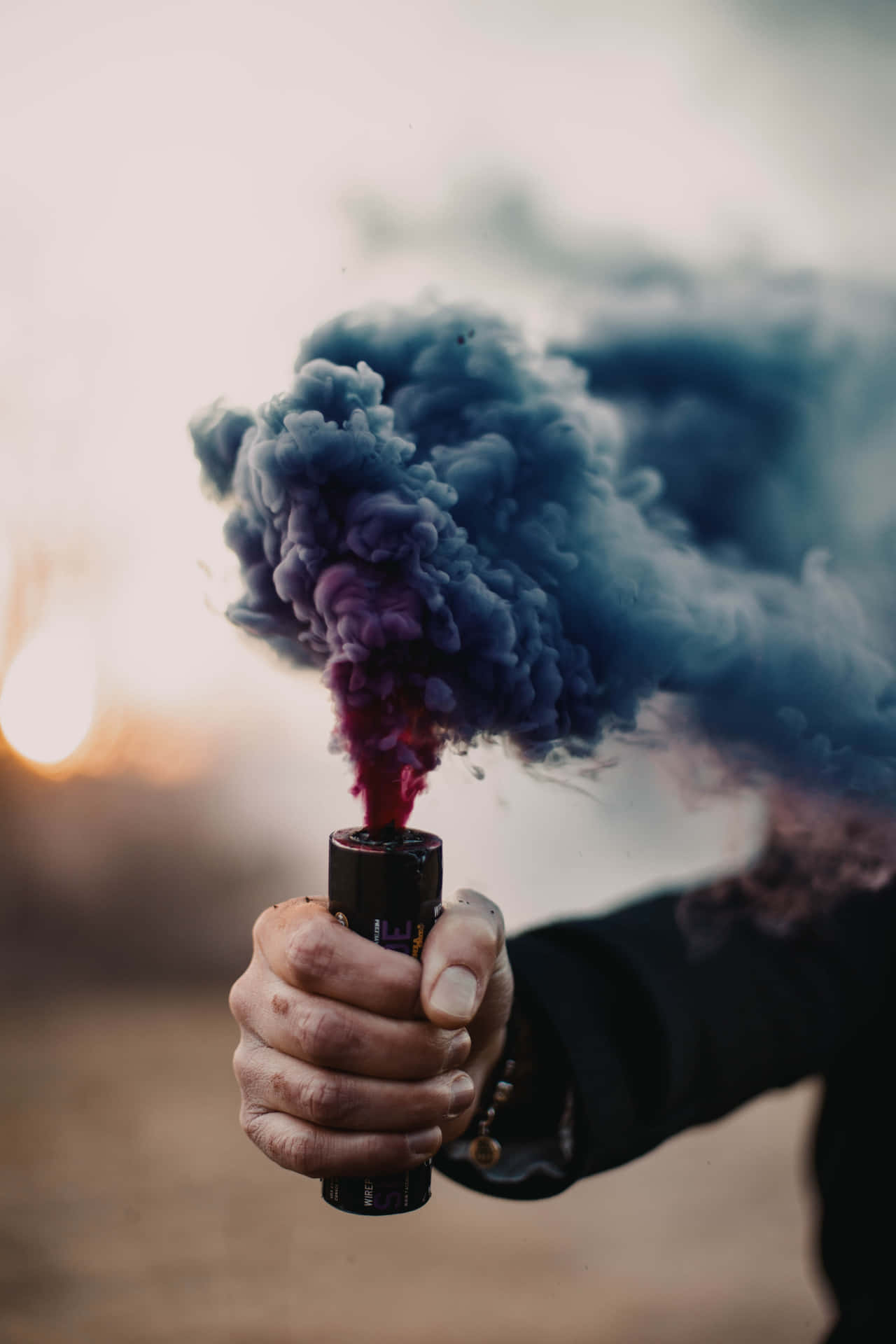Captivating Smoke Twisted Alongside Vivid Colors. Background