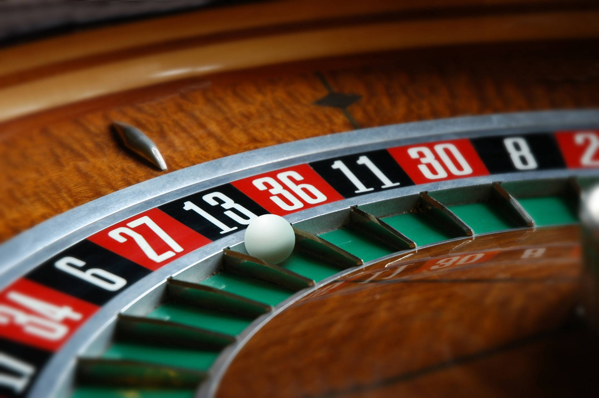 Captivating Spin Of The Roulette Wheel Background