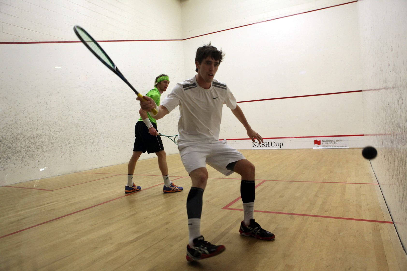 Captivating Squash Match In Progress Background