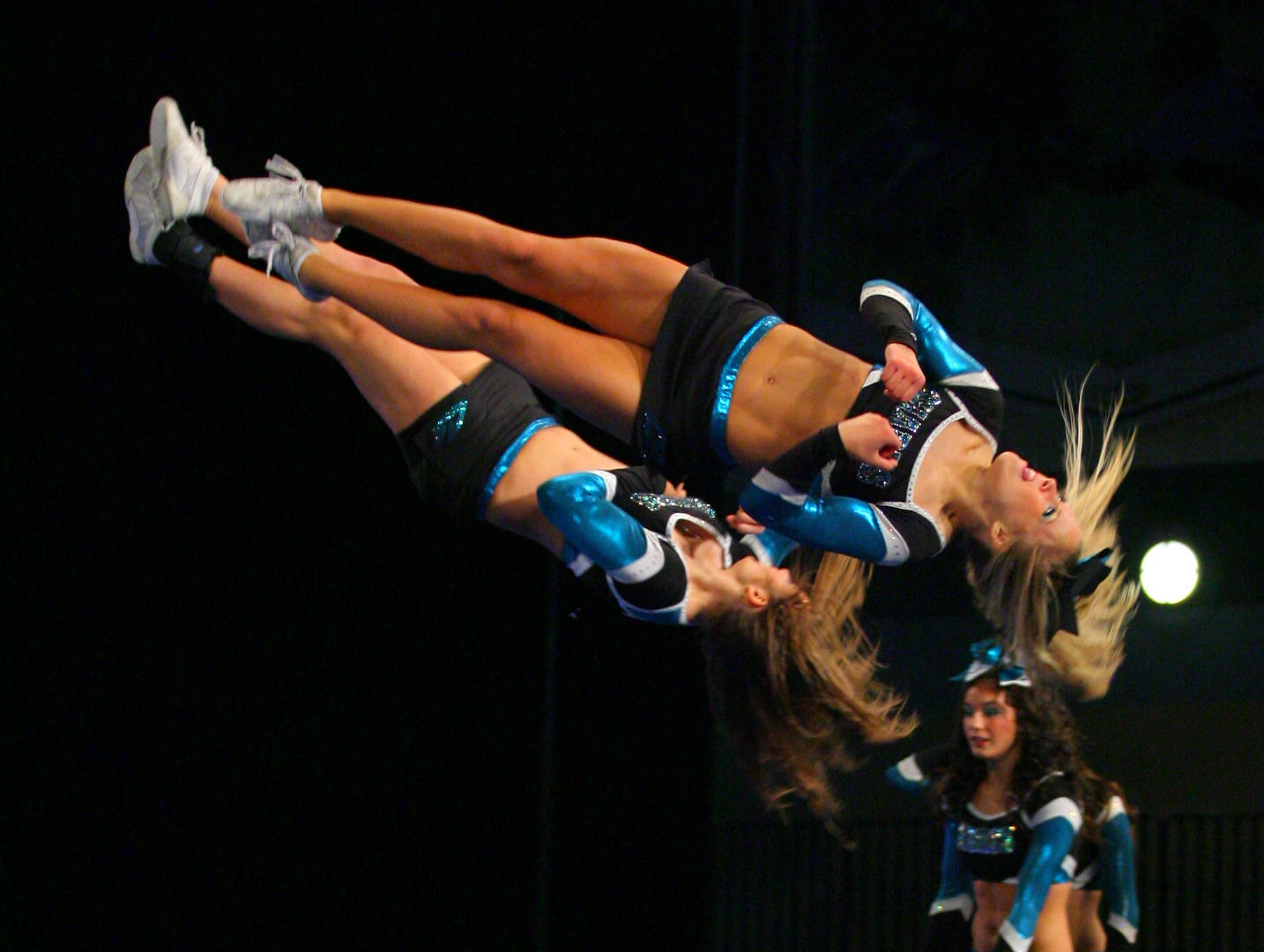 Captivating Tumble – An Exquisite Display Of Athleticism Background