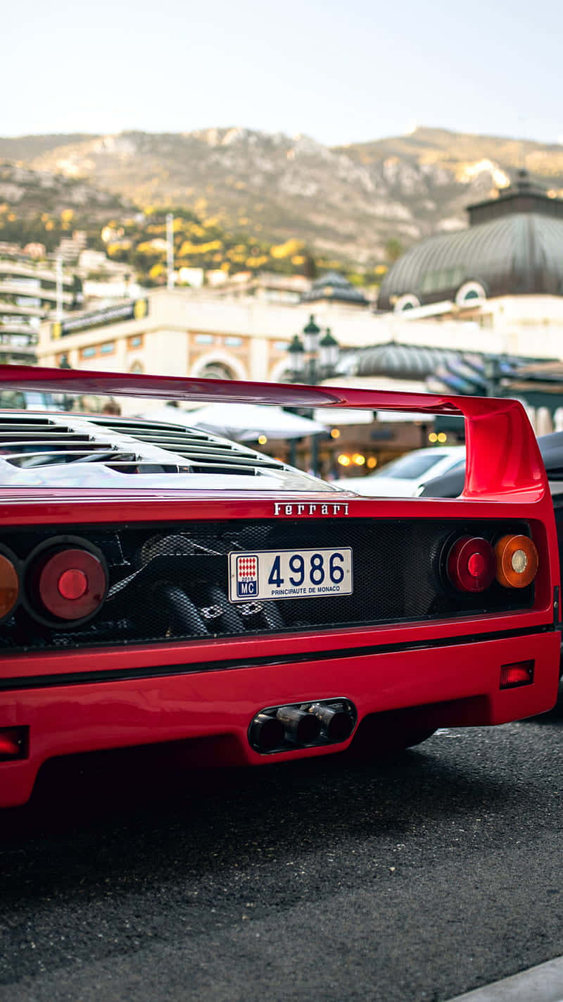 Captivating Vintage Ferrari Taking Center Stage Background