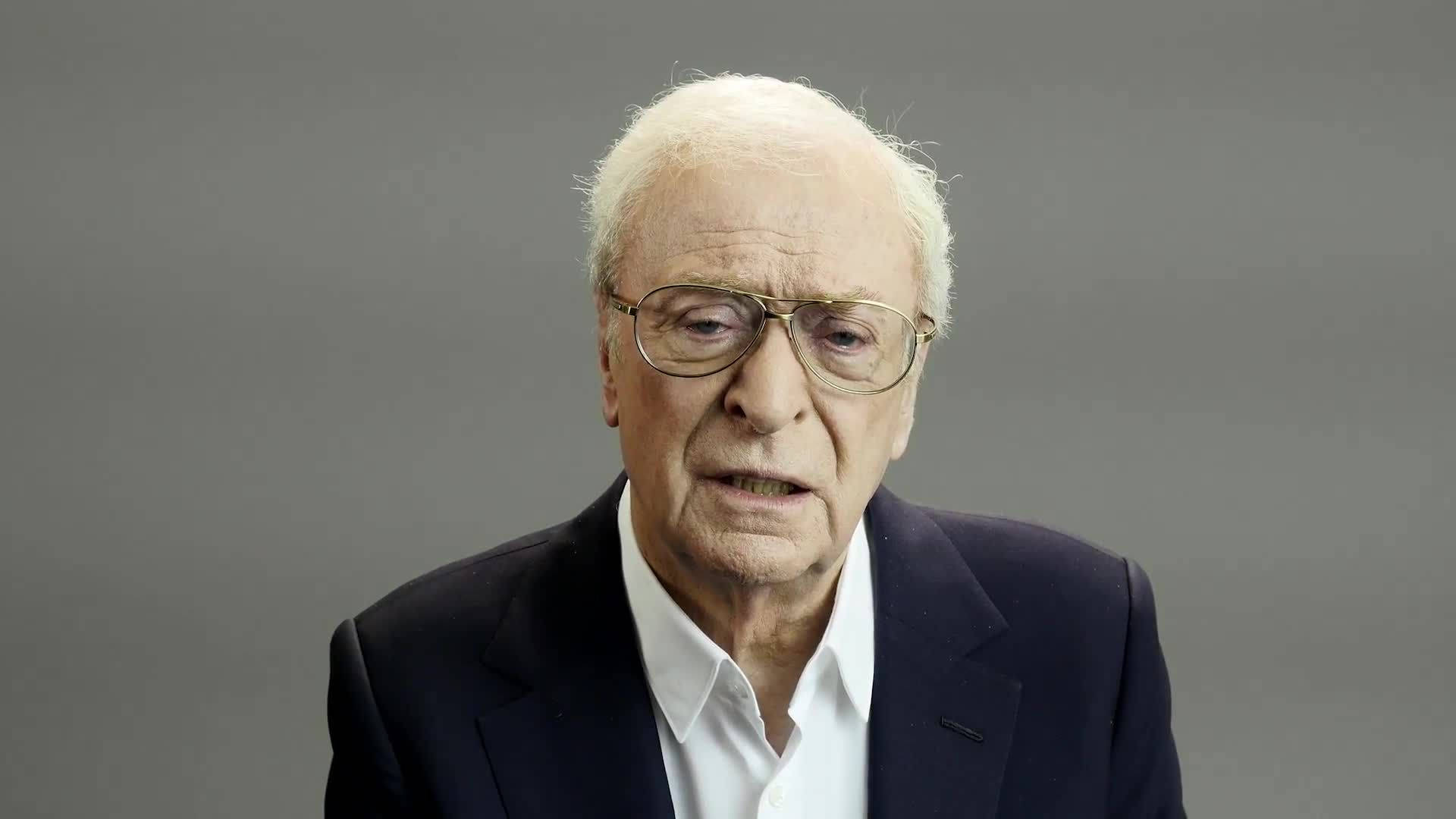 Captivating Vision Of Celebrated English Actor, Michael Caine Background