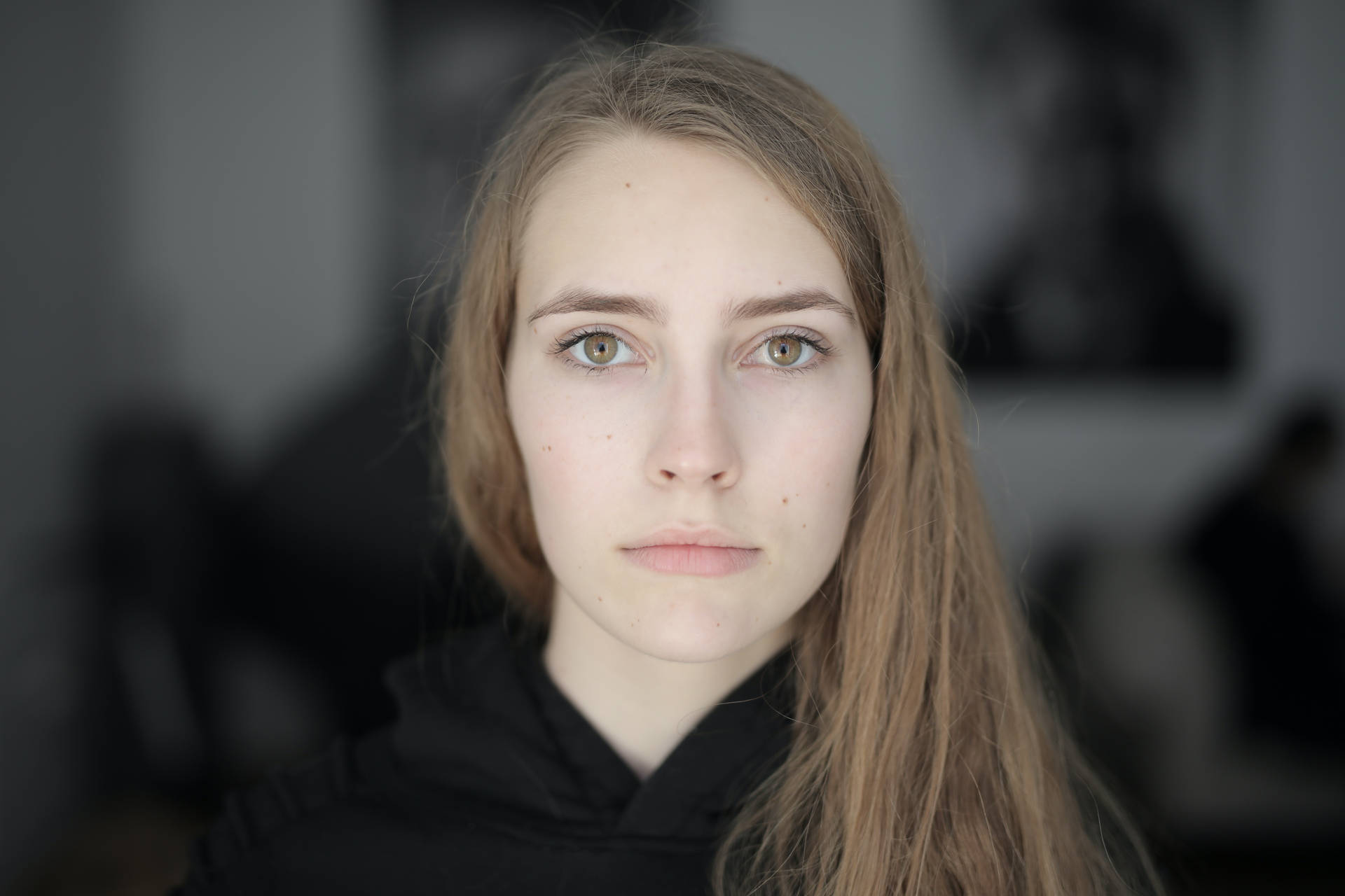 Captivating Woman With Brown Hair And Eyes Headshot Background