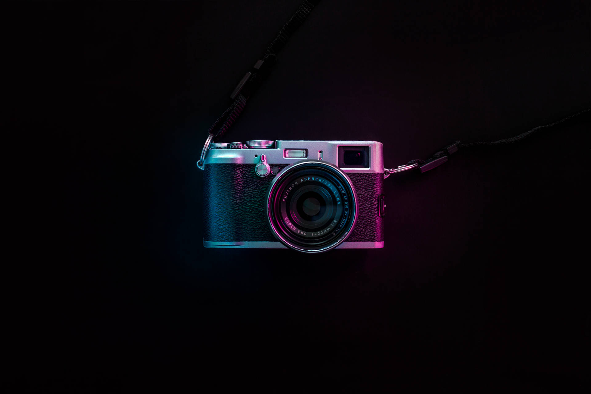 Capture The Magic Of Life With A Black And Silver Slr Camera Background