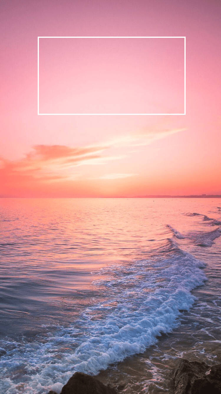 Capture The Mesmerizing Colors Of The Pink Sunset On Your Iphone Background