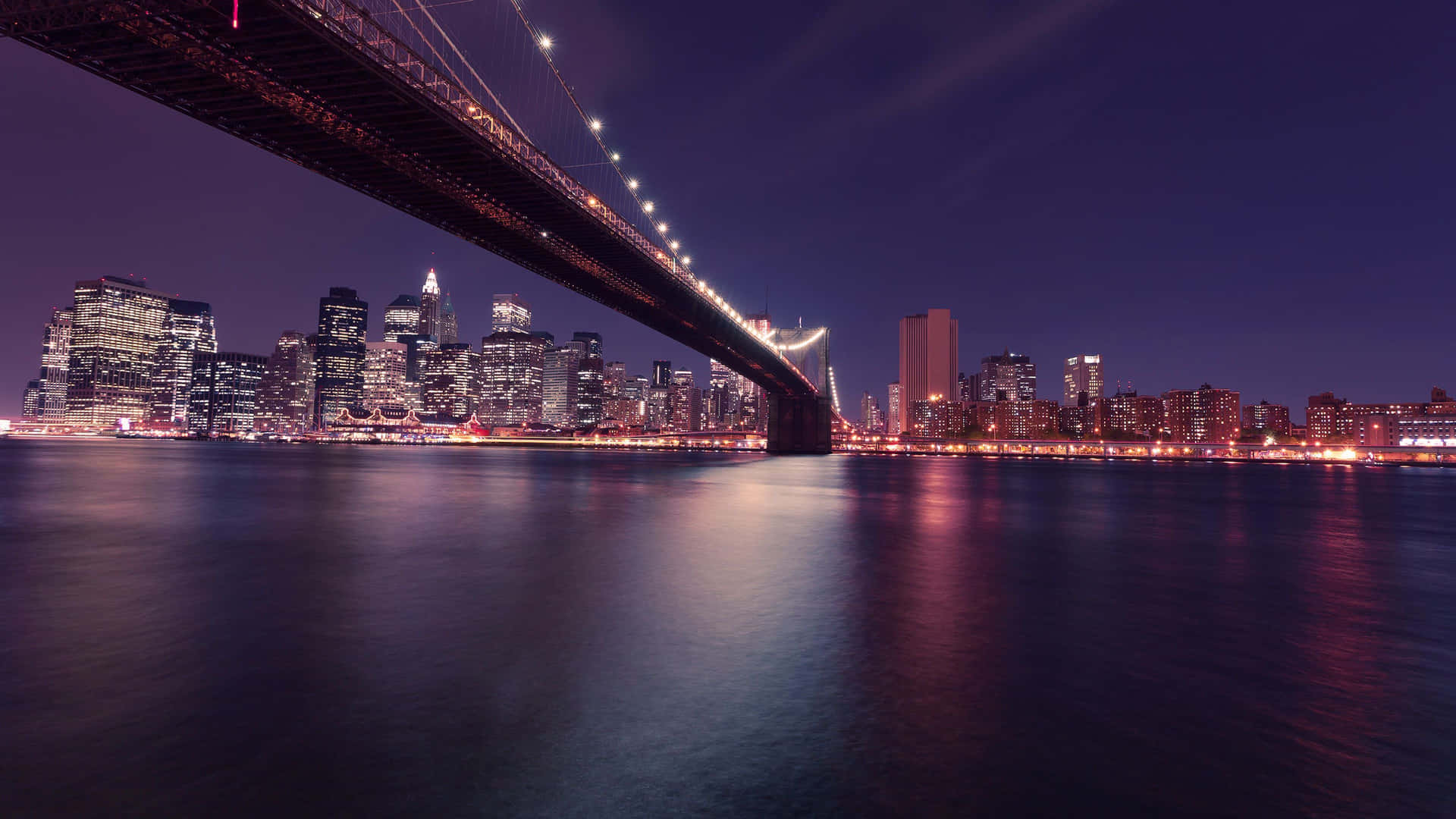 Capturing The Glittering Brilliance Of New York City At Night Background