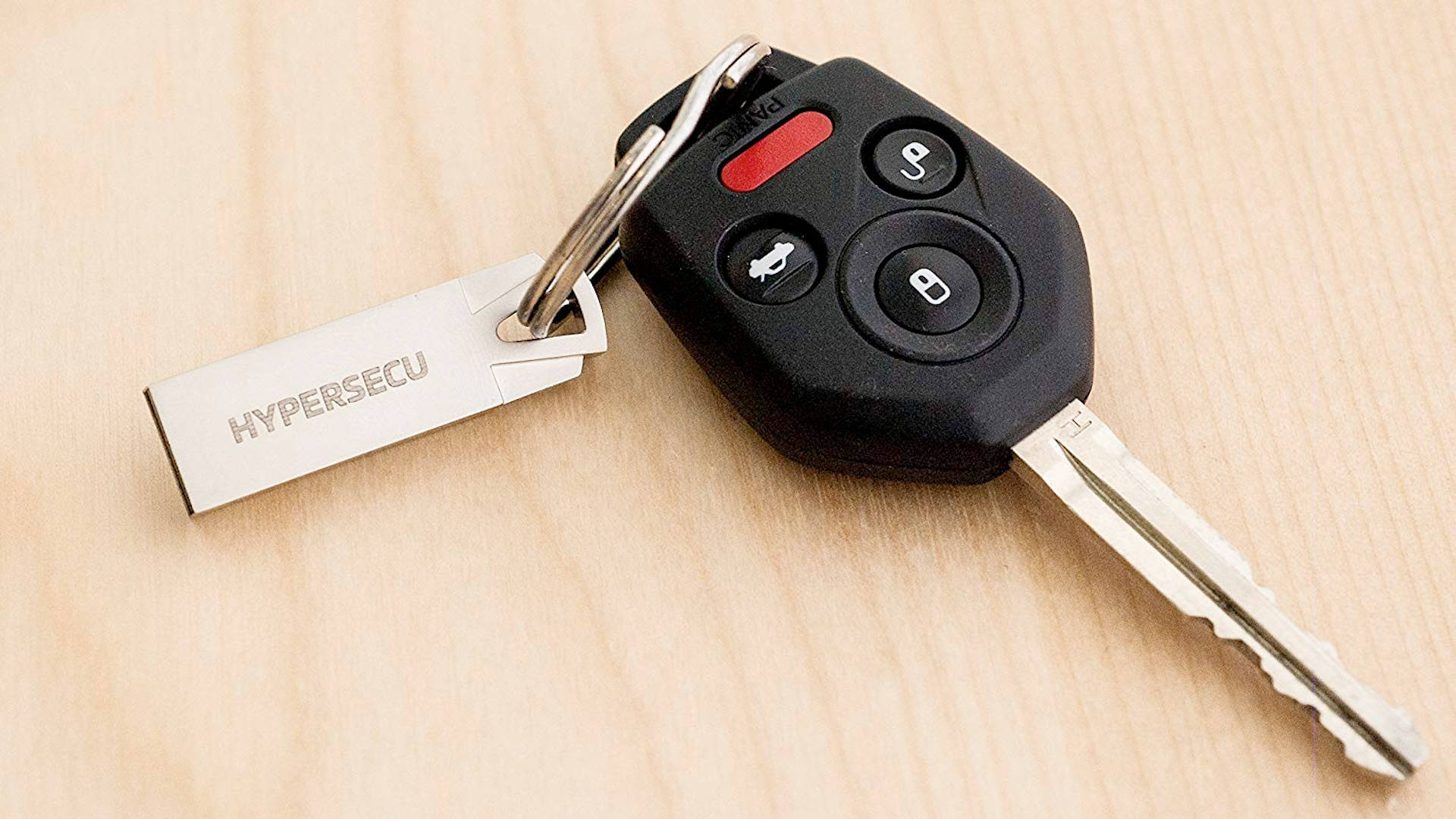 Car Key On Wooden Surface Background