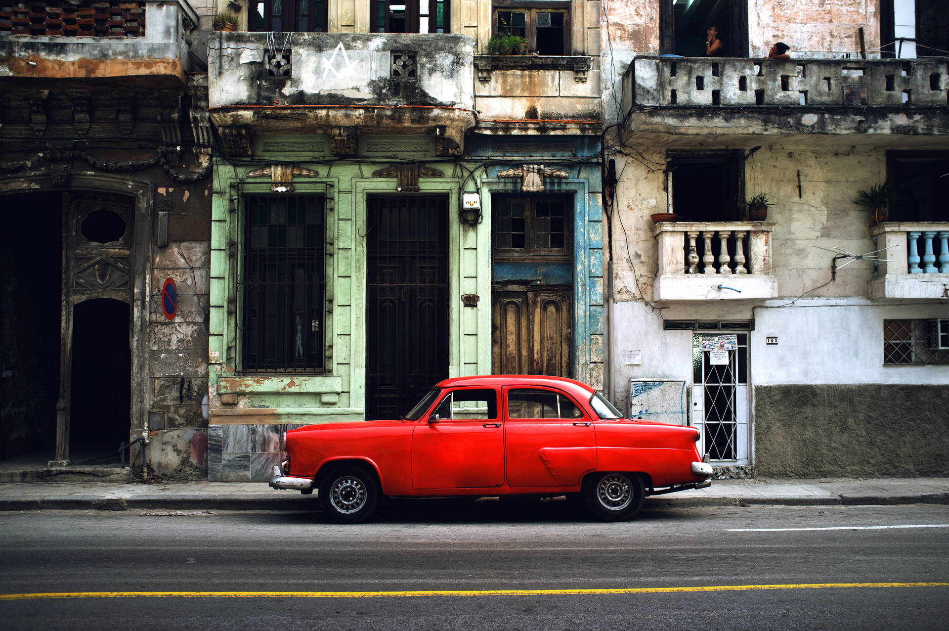 Car Parked On The Road In Cuba Background