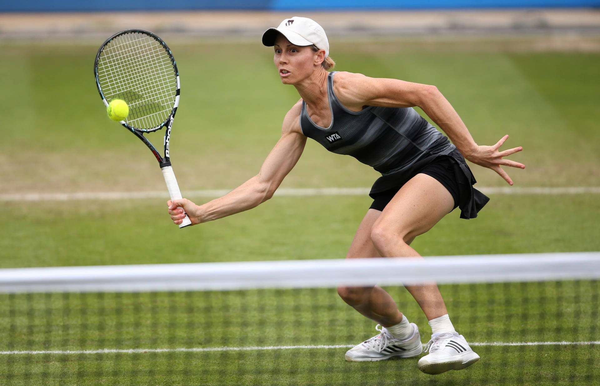 Cara Black In Action During A Tennis Match Background