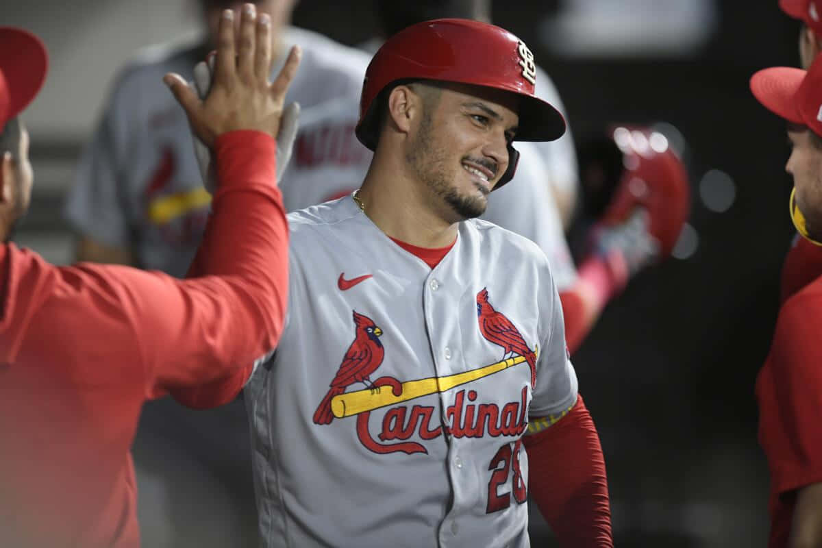 Cardinals Player Celebratingwith Teammates Background