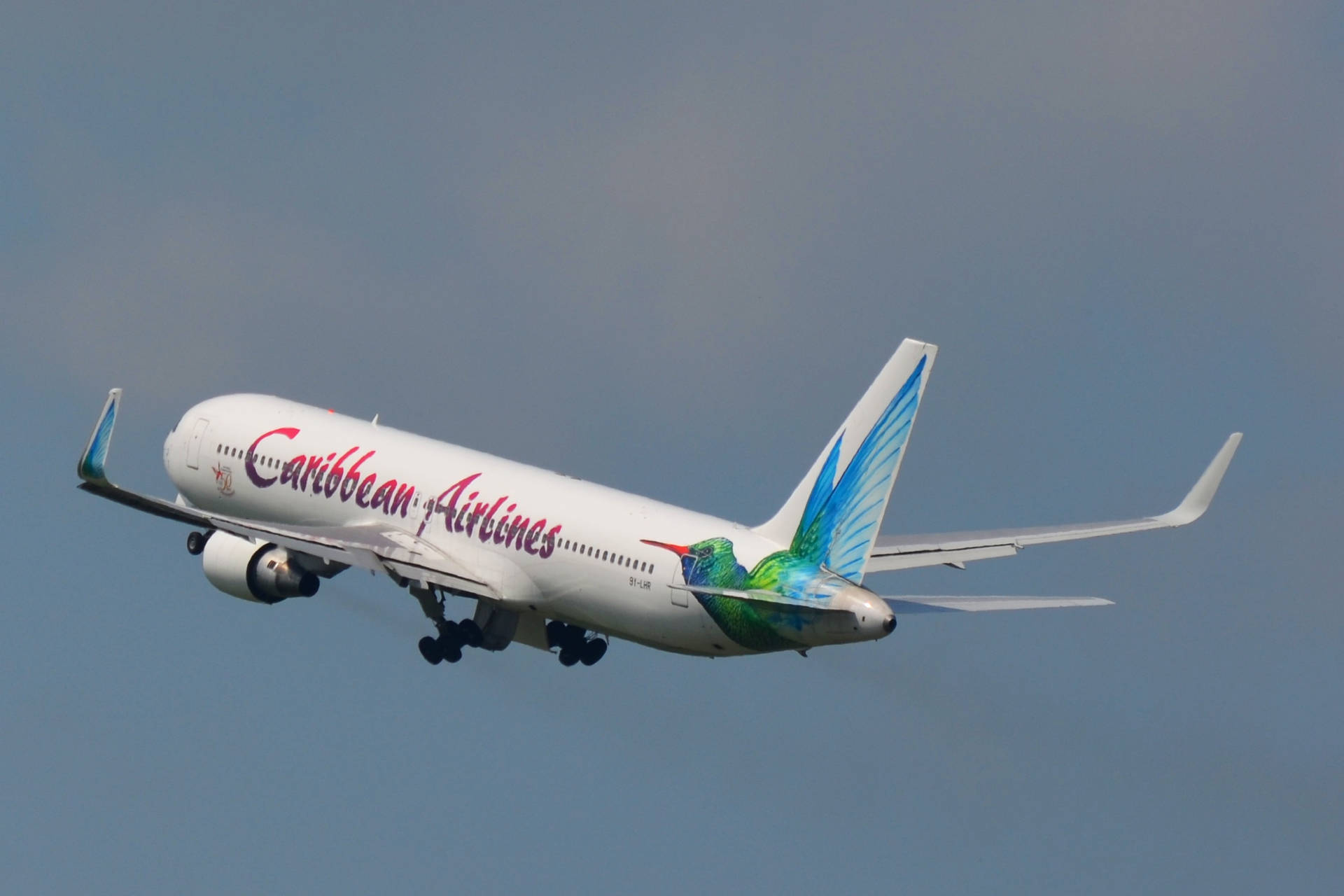 Caribbean Airlines Airplane Gliding Upwards