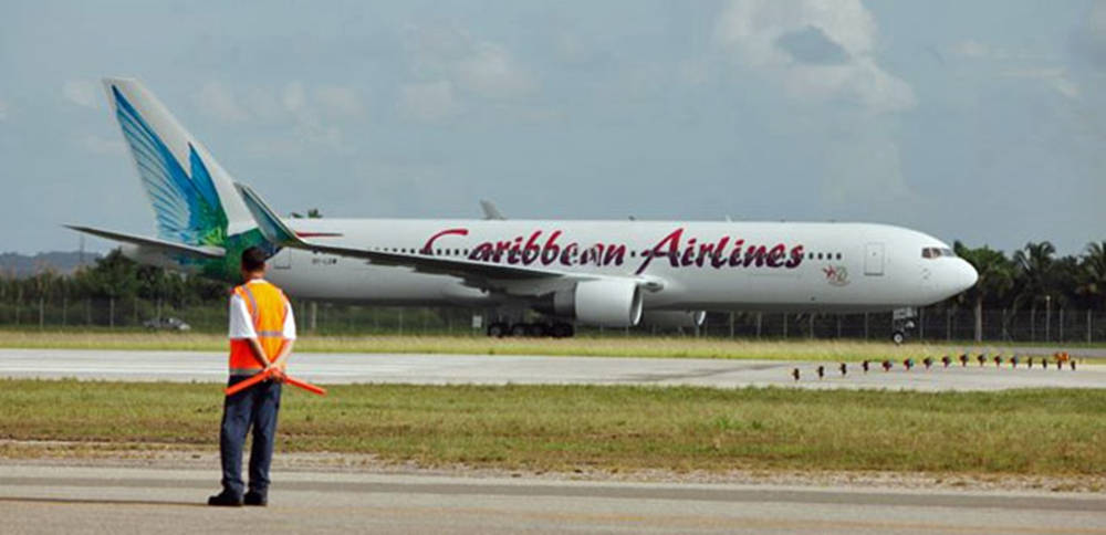 Caribbean Airlines Plane And Airport Enforcer