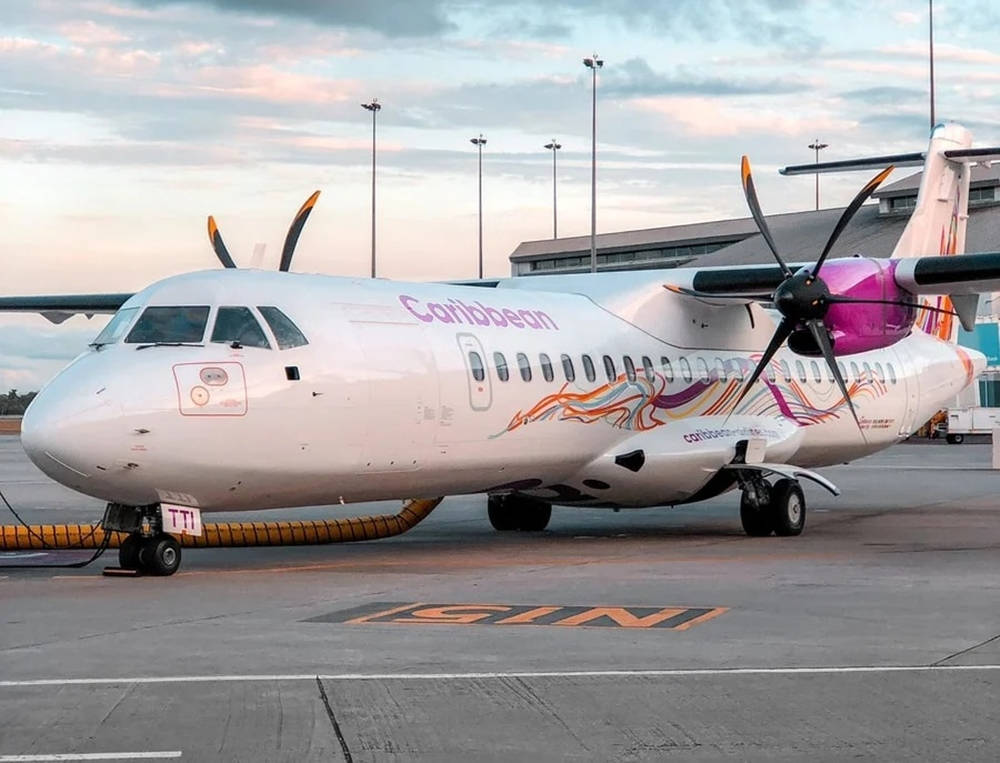 Caribbean Airlines Small Plane Purple Propeller