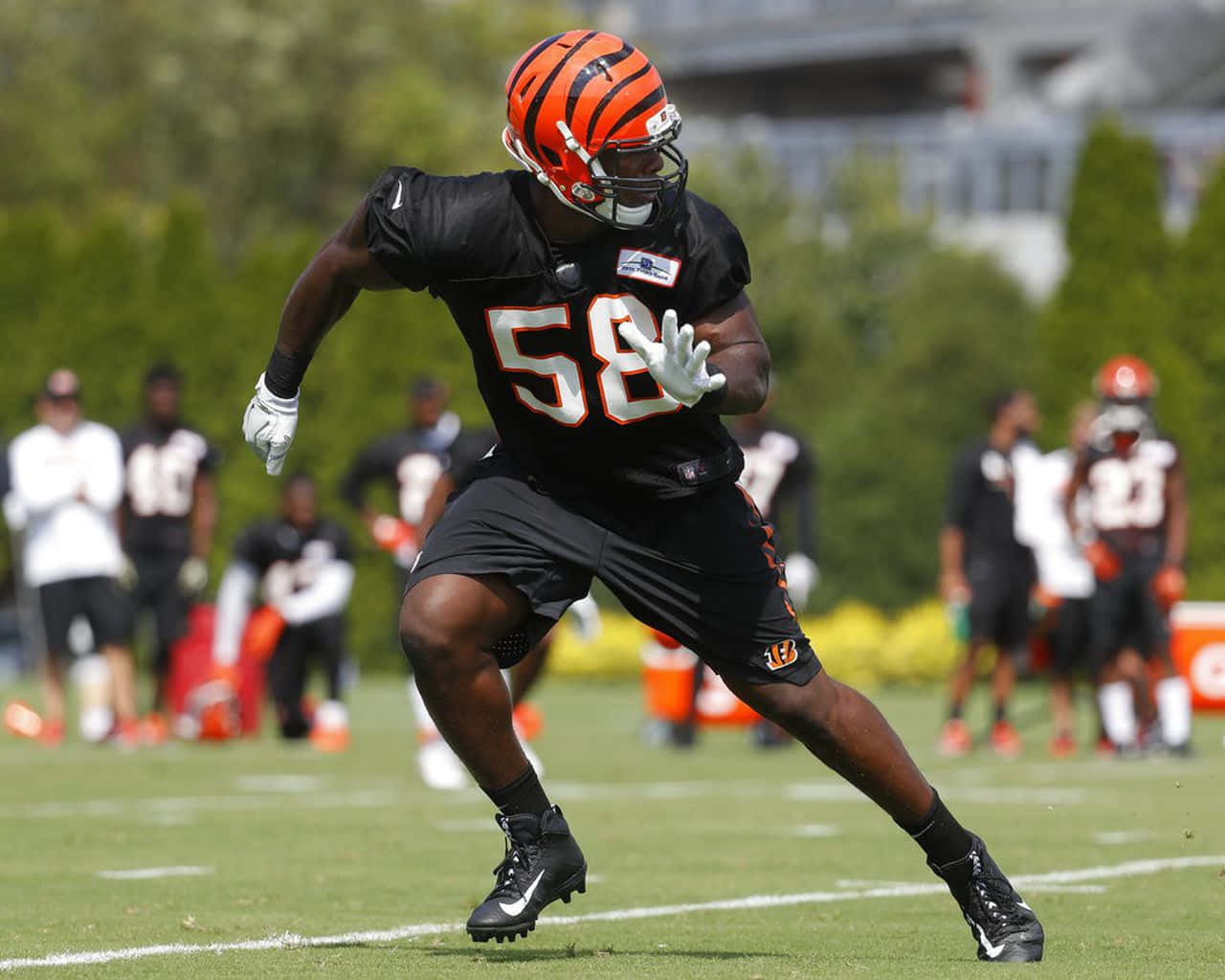 Carl Lawson Running Background