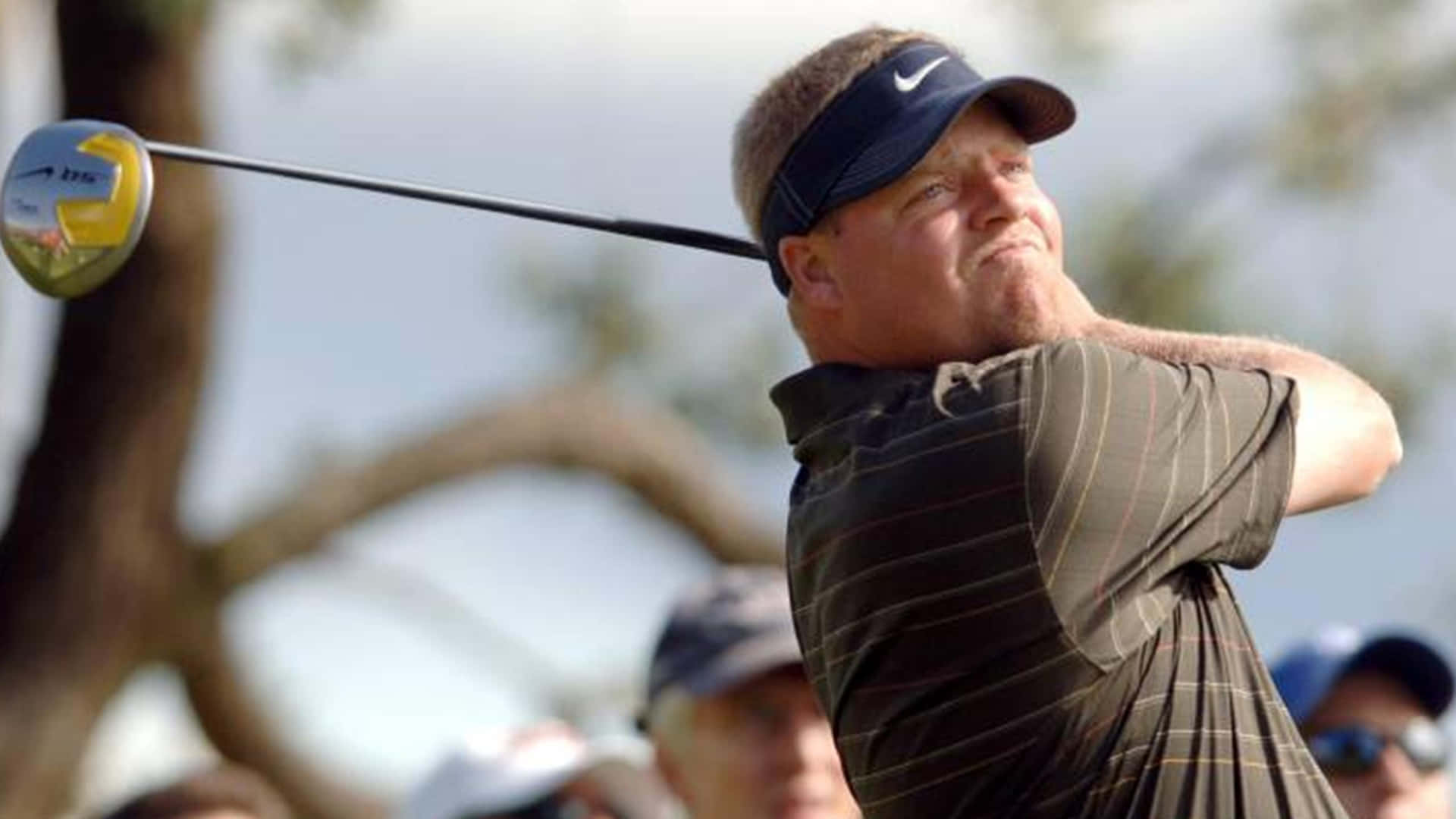 Carl Pettersson In Full Swing At A Championship Background