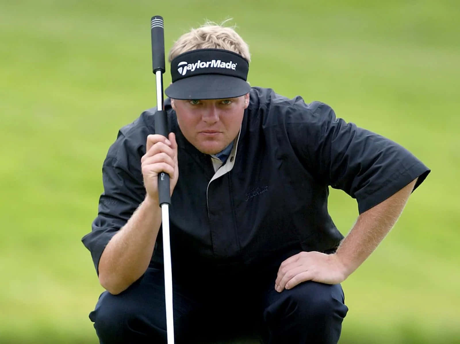 Carl Pettersson Swinging The Golf Club Background