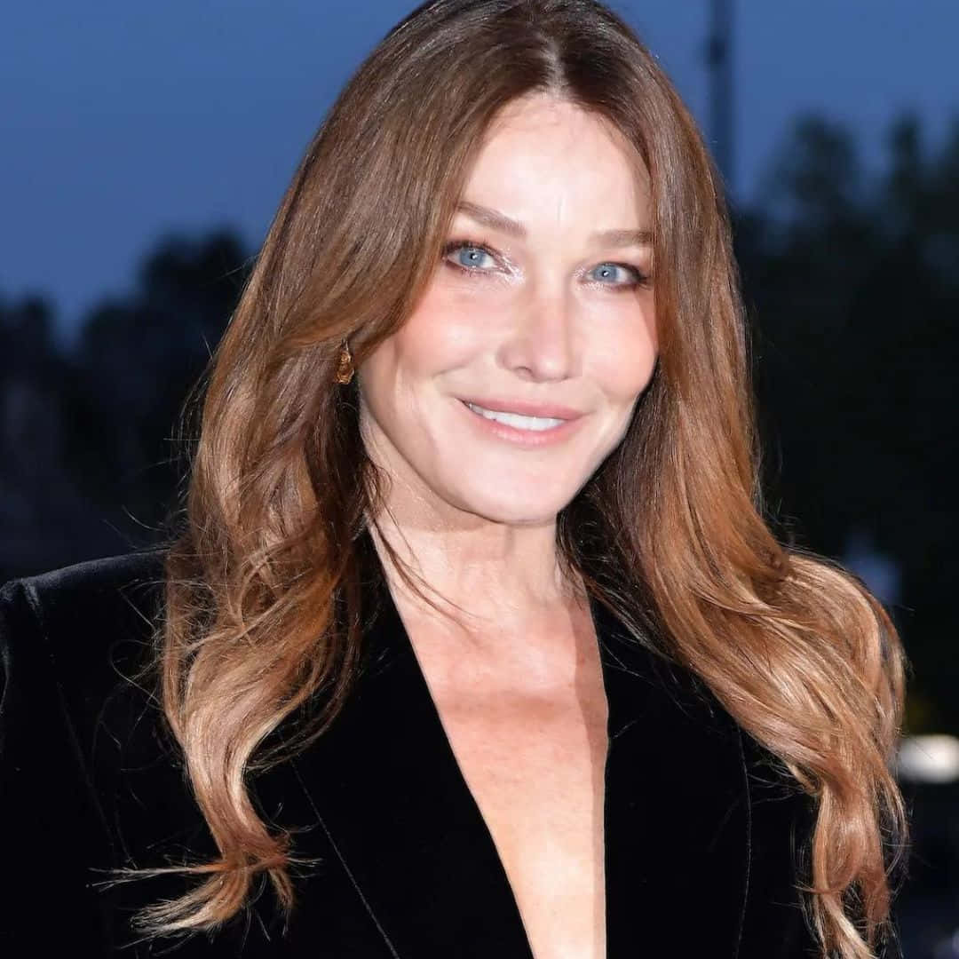 Carla Bruni In An Elegant Portrait Background