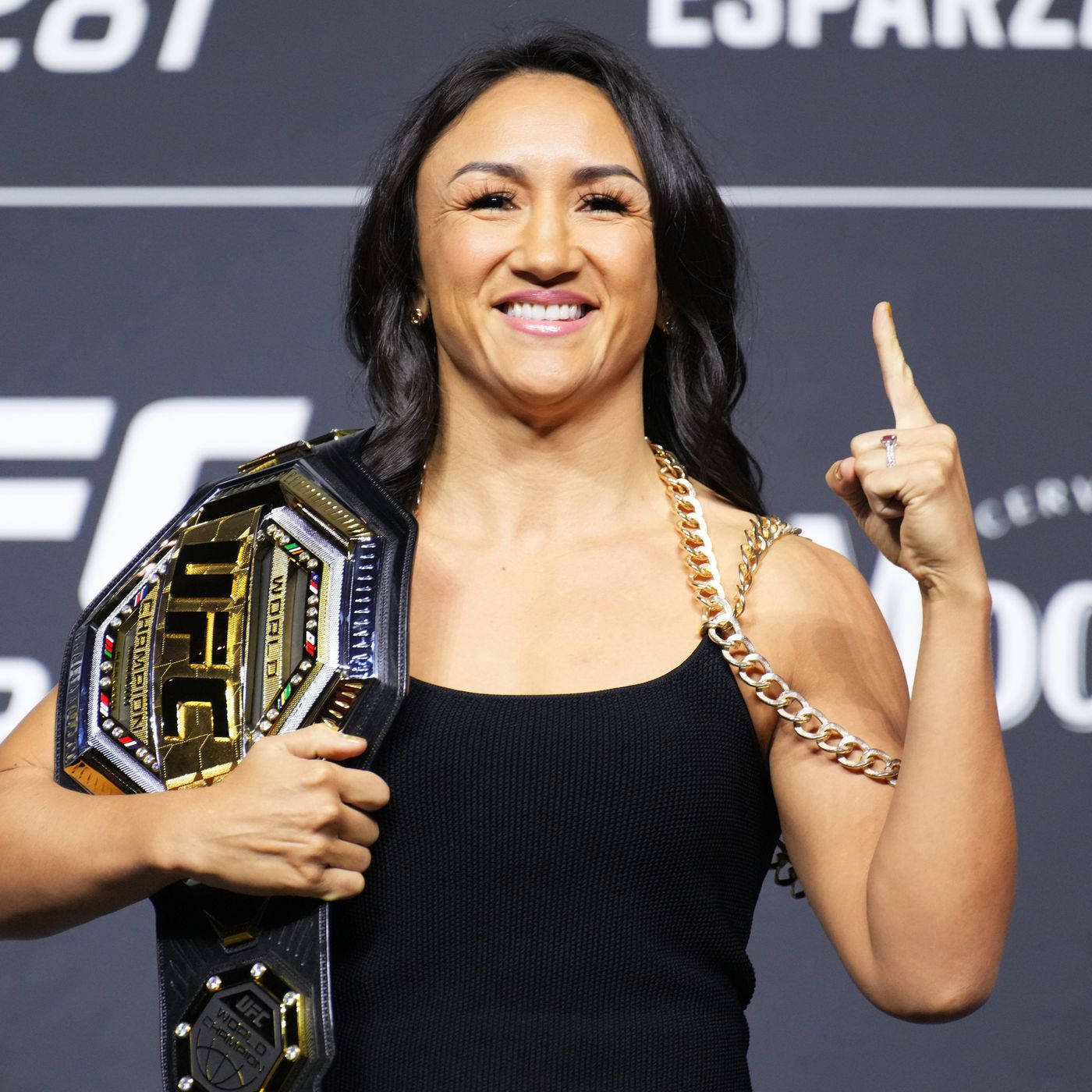 Carla Esparza Pointing Up Background