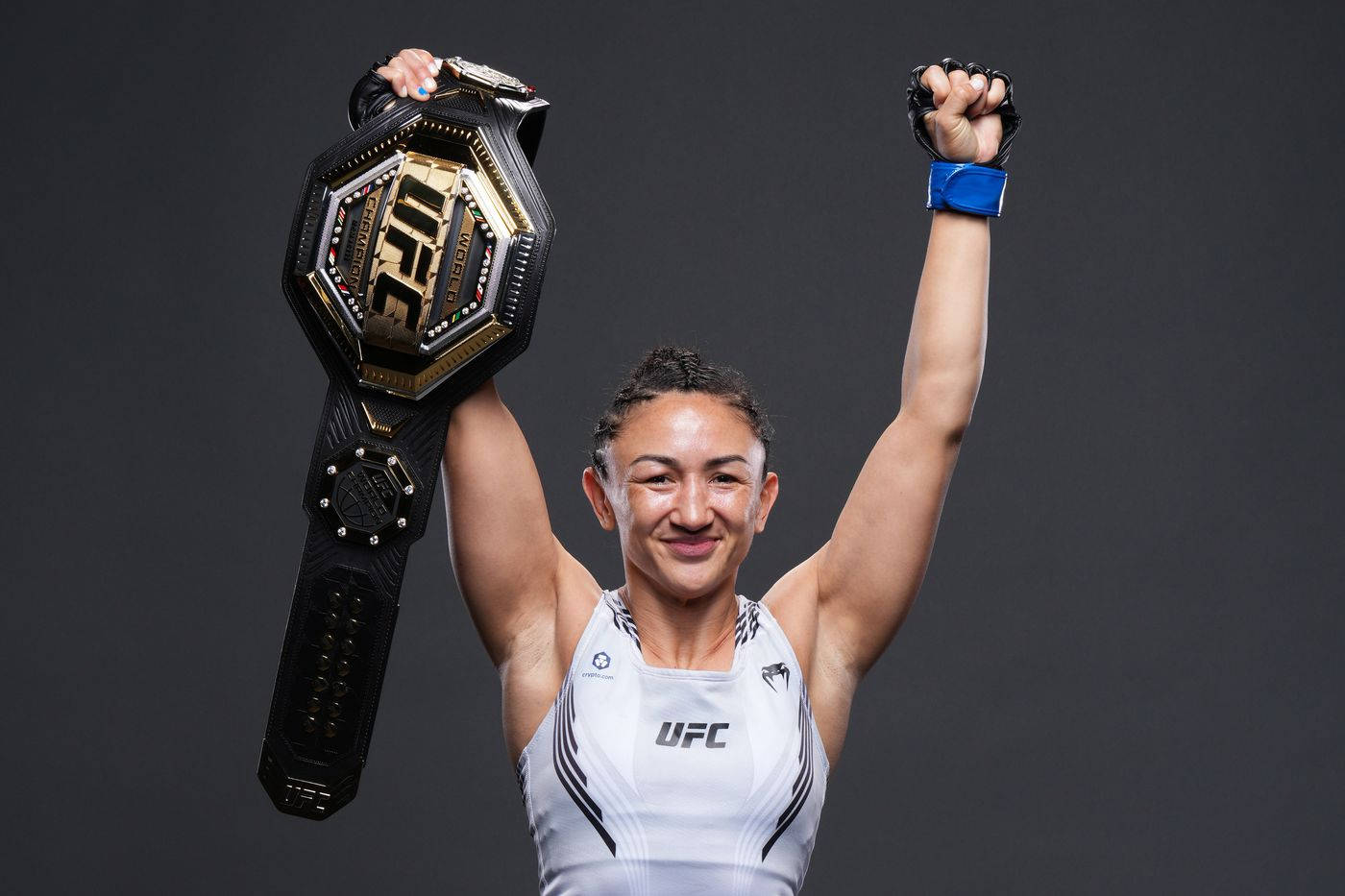 Carla Esparza Raises Belt Background