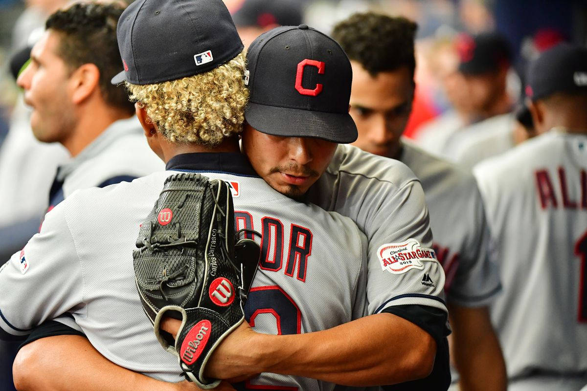 Carlos Carrasco Hugging Francisco Lindor Background