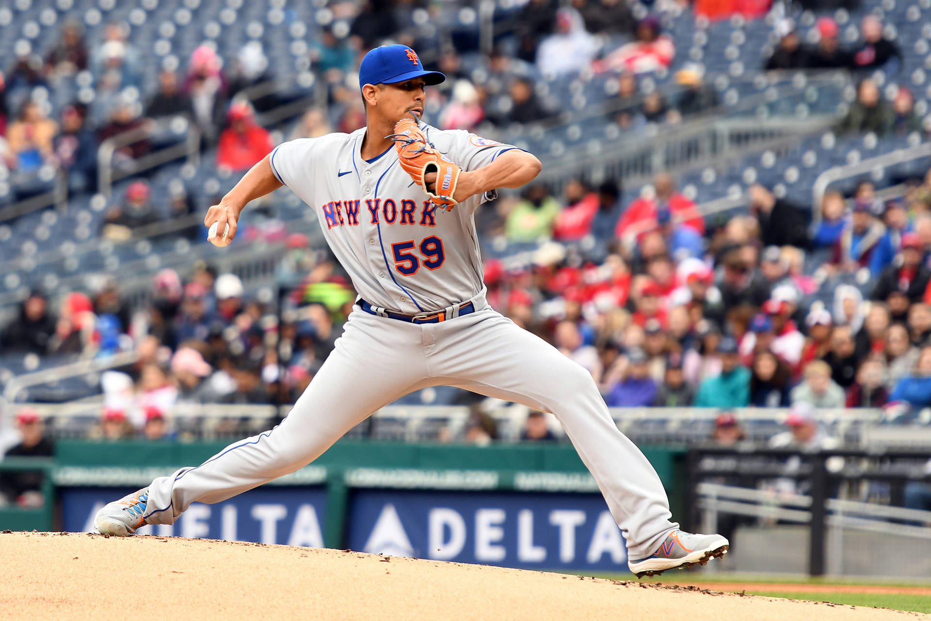 Carlos Carrasco In Blurred People Background Background