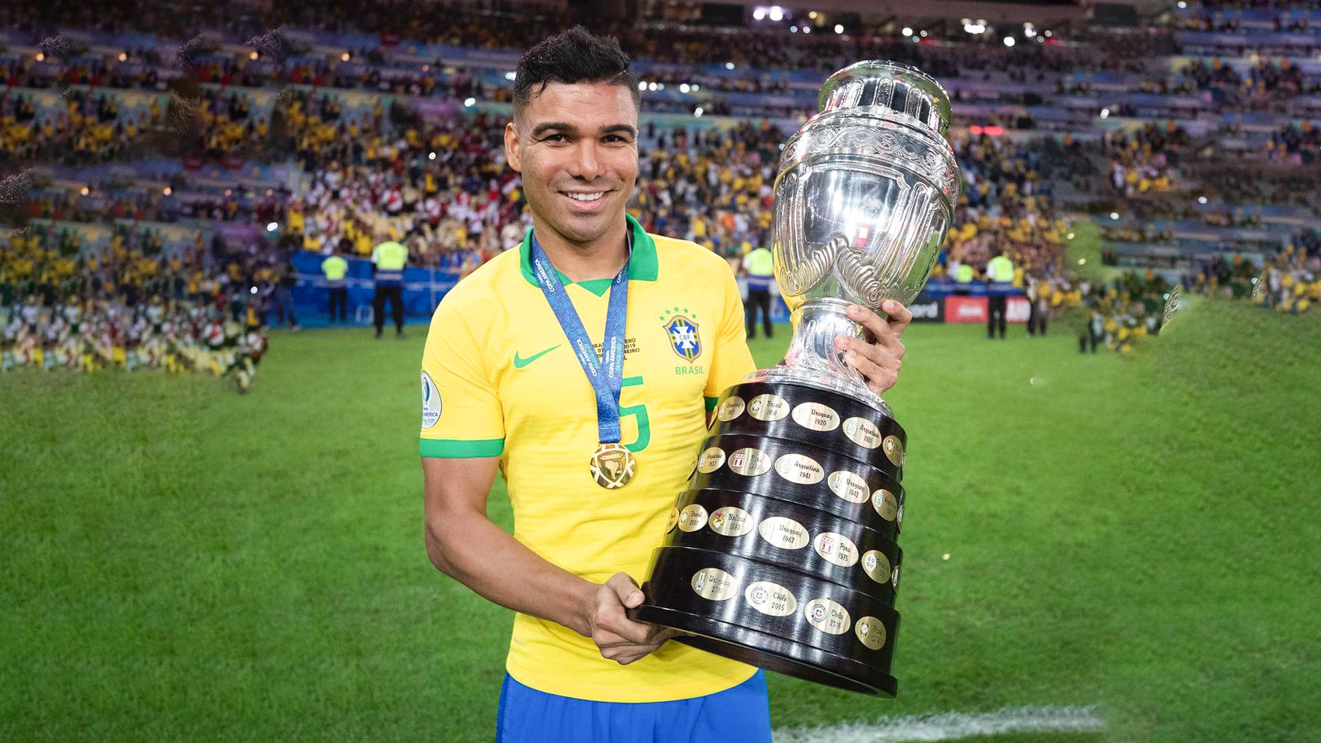 Carlos Casimiro Brazil Holding Trophy Background