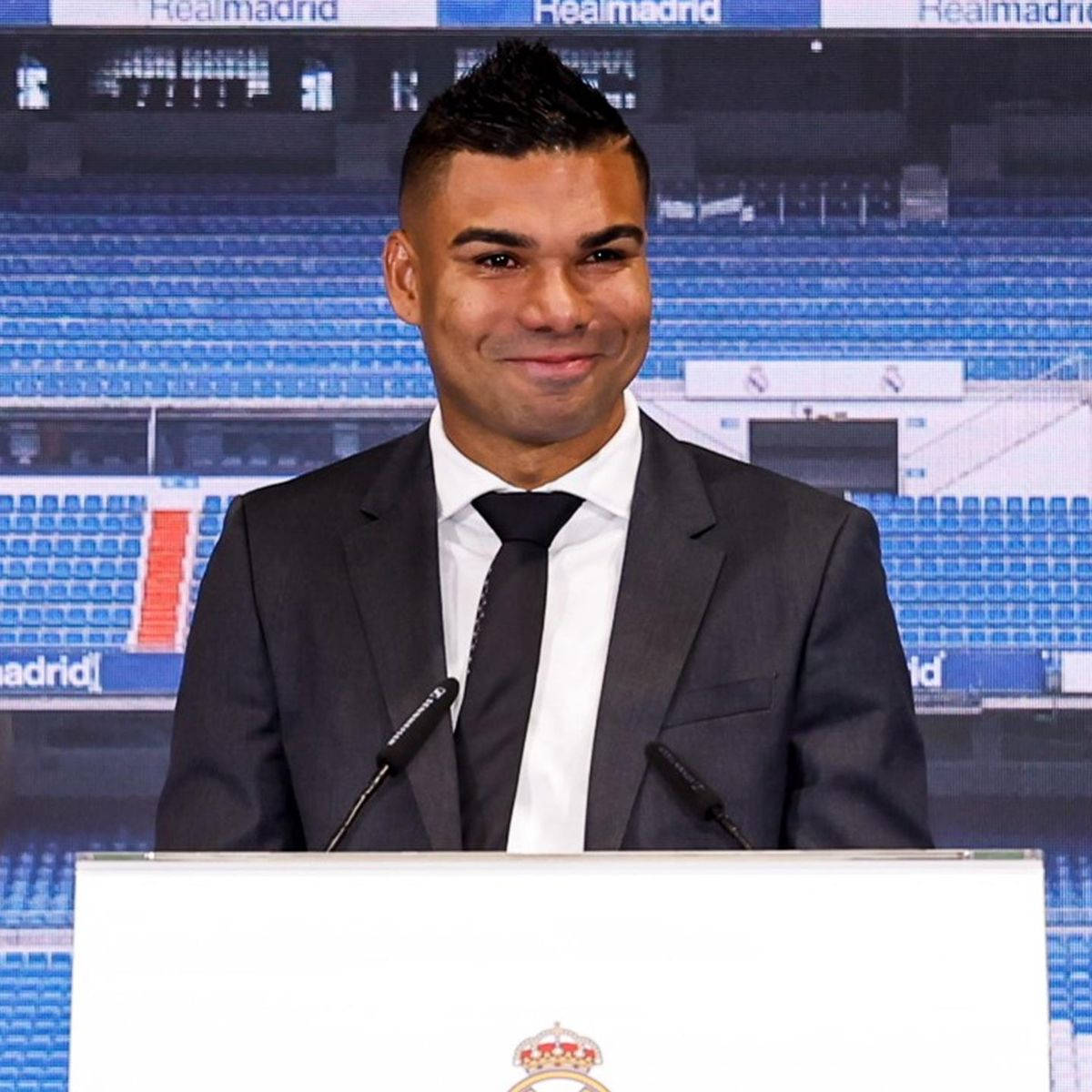 Carlos Casimiro Wearing Suit Background