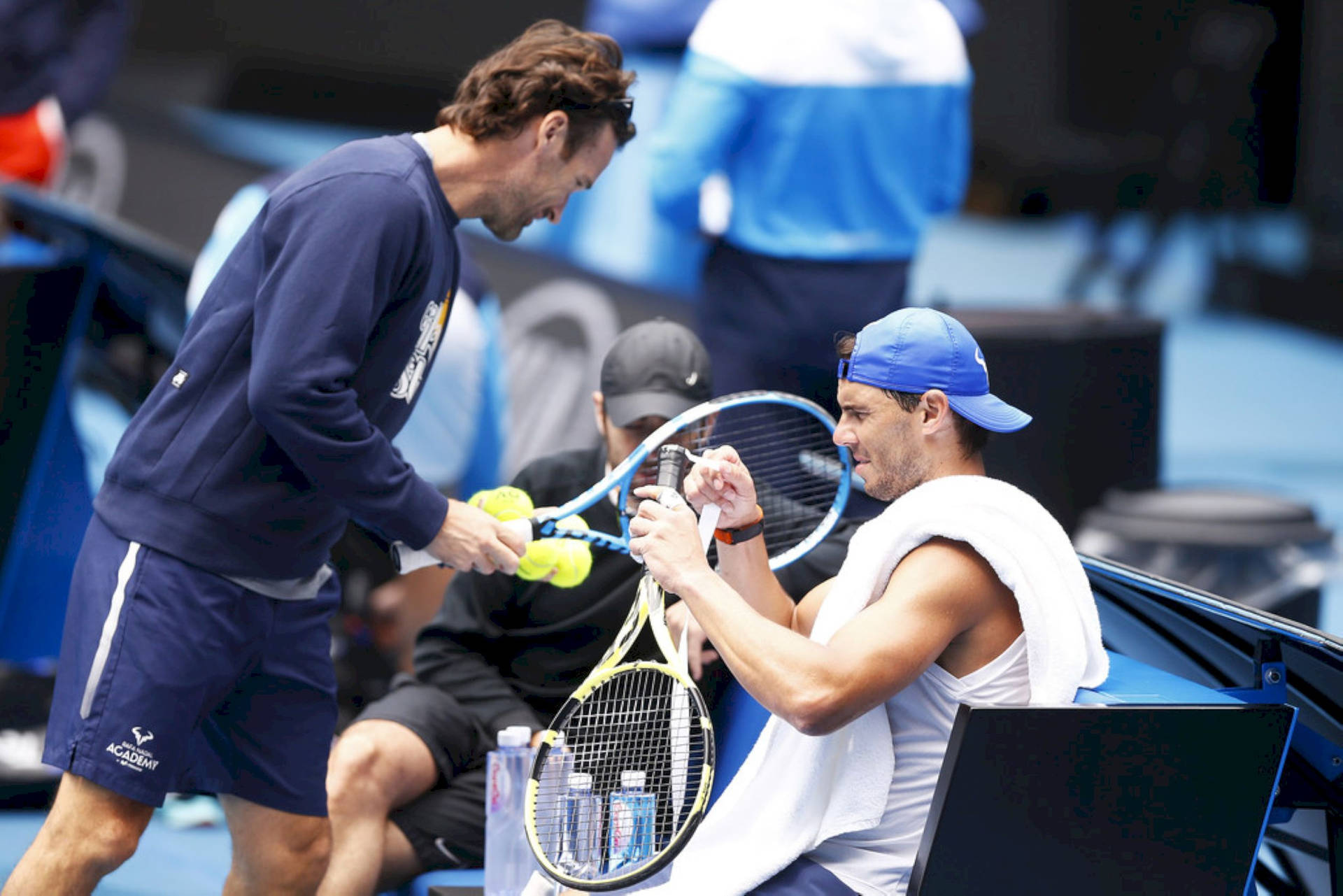 Carlos Moya Assisting Nadal Background