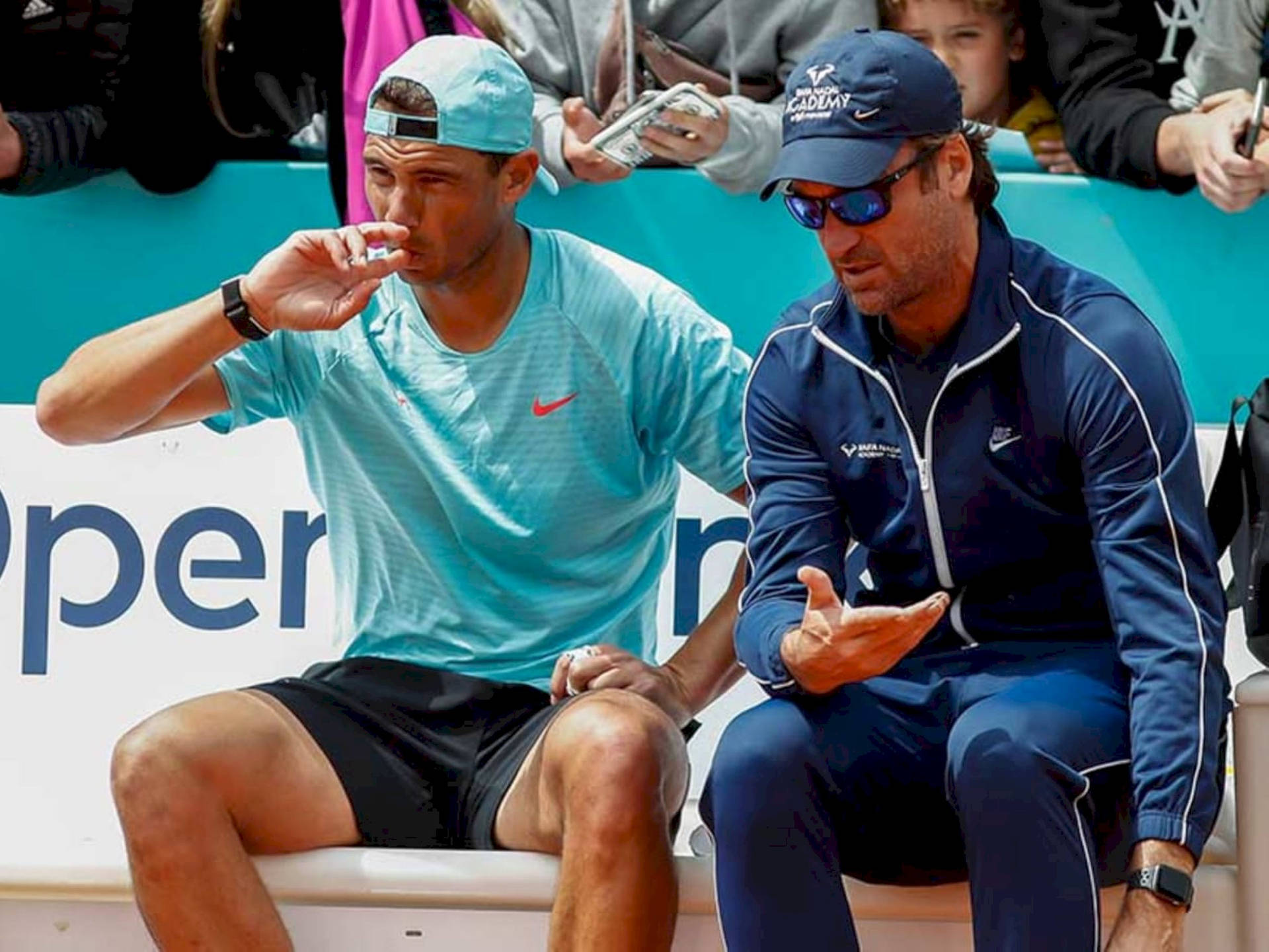 Carlos Moya Gesturing With Rafael Nadal