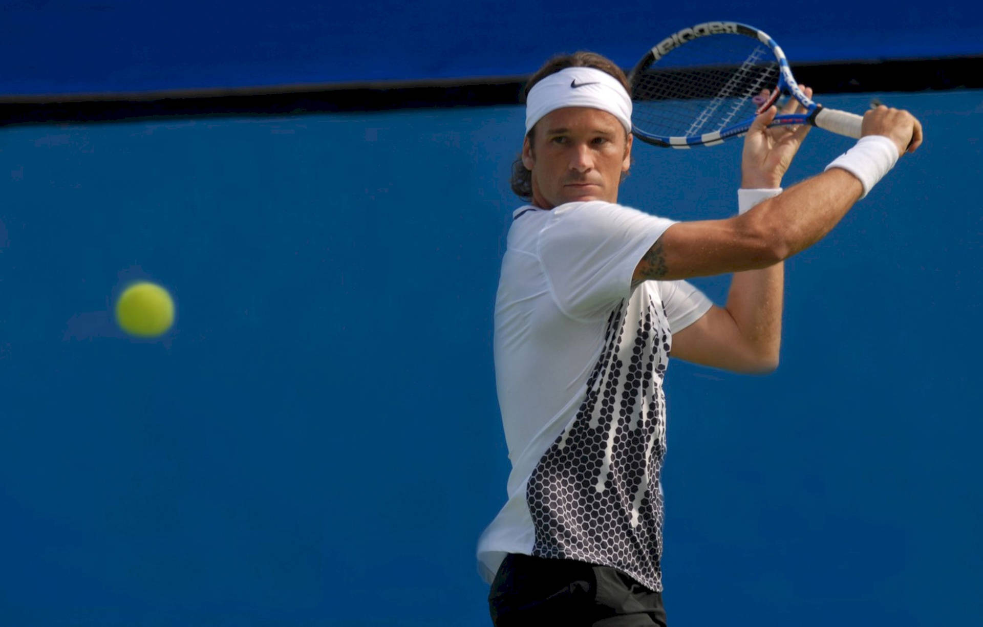 Carlos Moya In Action - Tennis Match