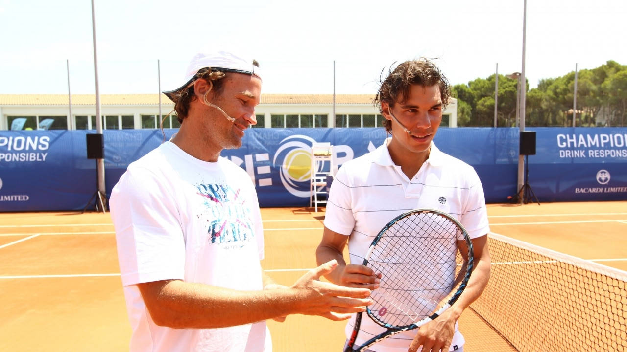 Carlos Moya In Court With Nadal