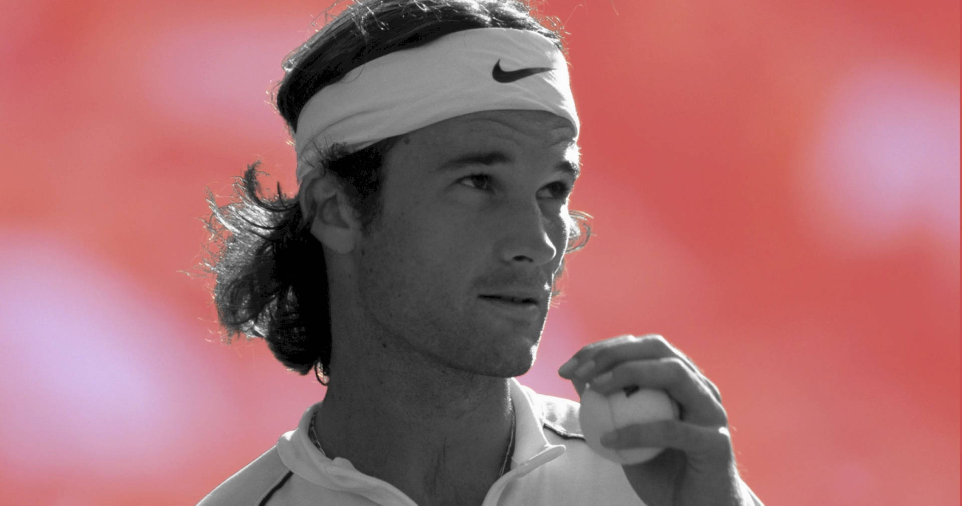 Carlos Moya Showcasing His Tennis Skills In Black And White. Background