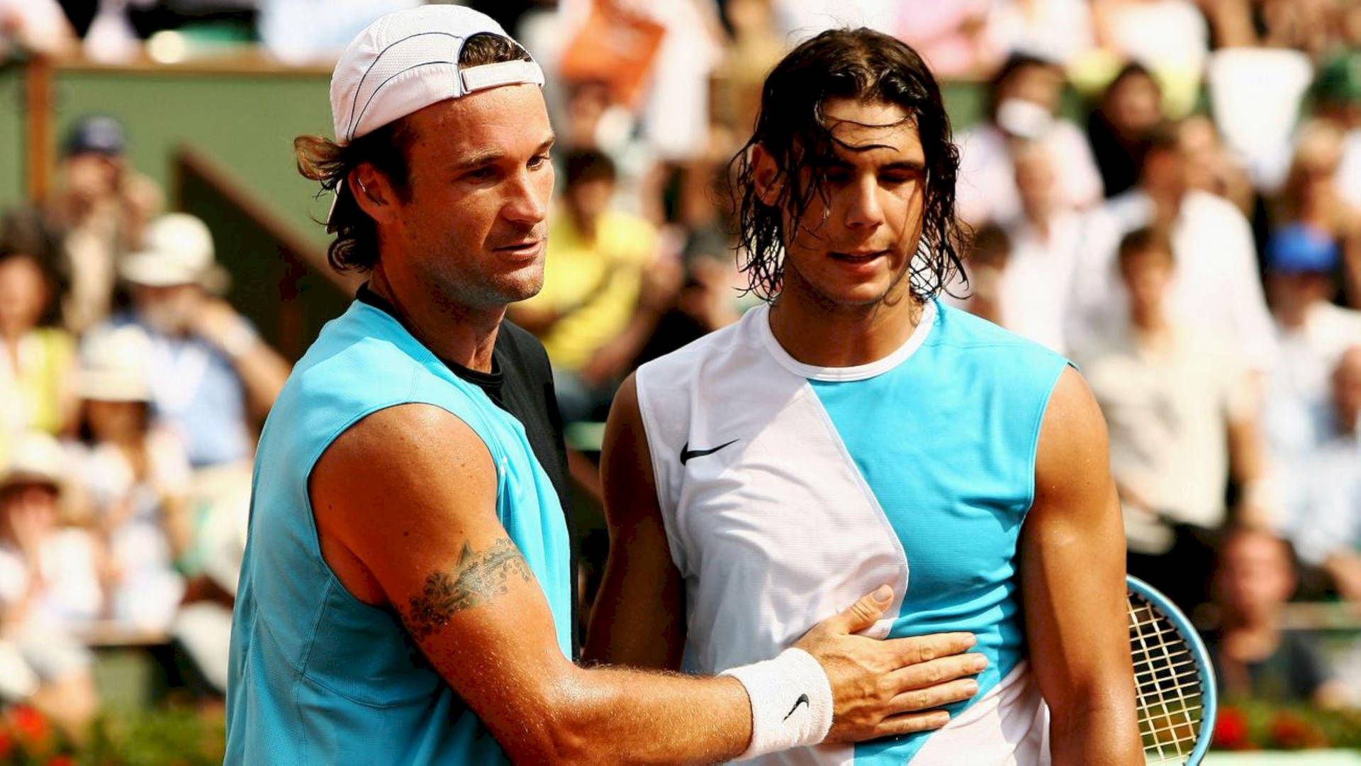 Carlos Moya Touching Young Nadal Chest Background