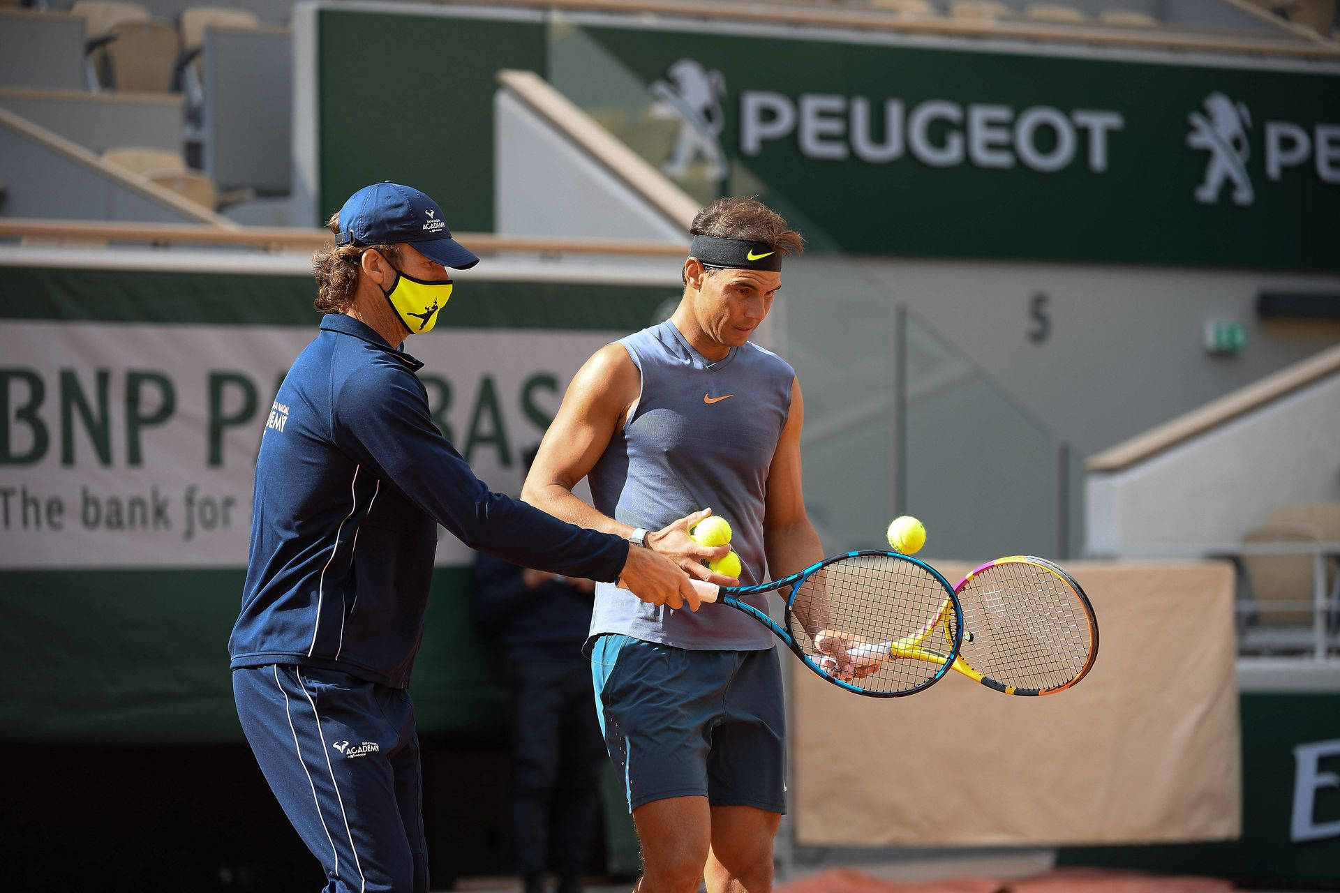 Carlos Moya Yellow Mask Coaching Nadal Background