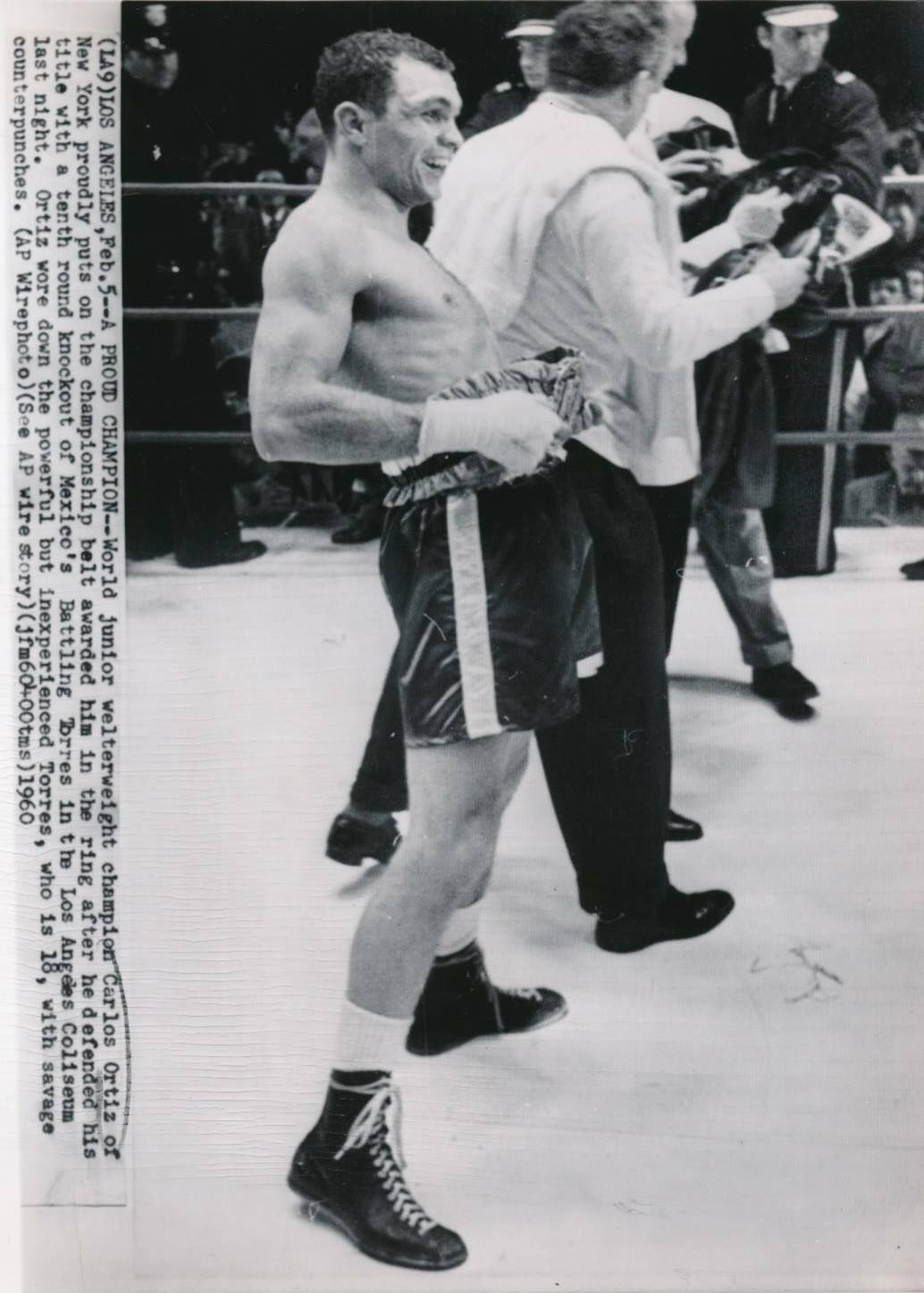 Carlos Ortiz Showing Off His Title