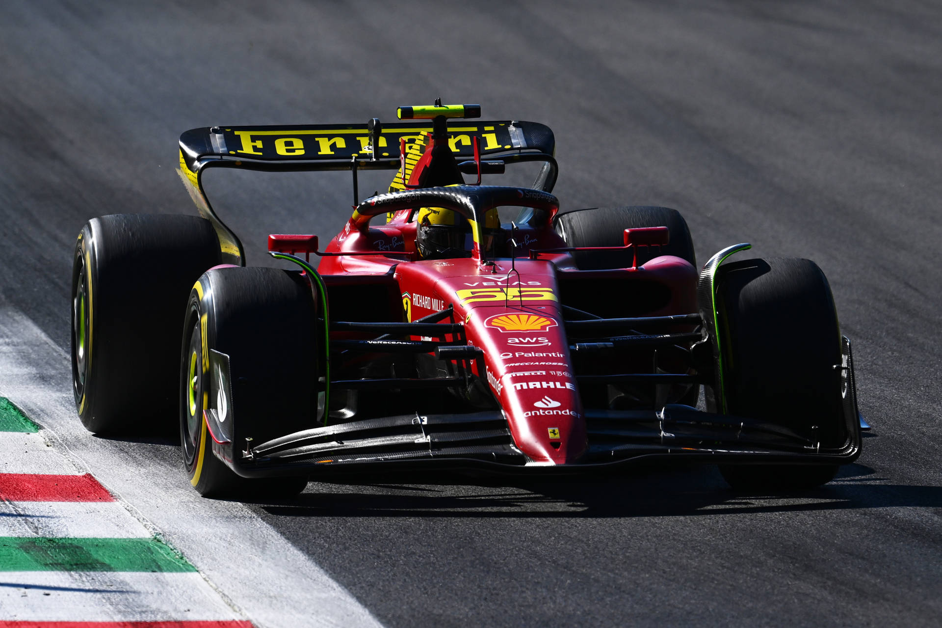 Carlos Sainz Jr In His Blazing Red Ferrari At A Grand Prix