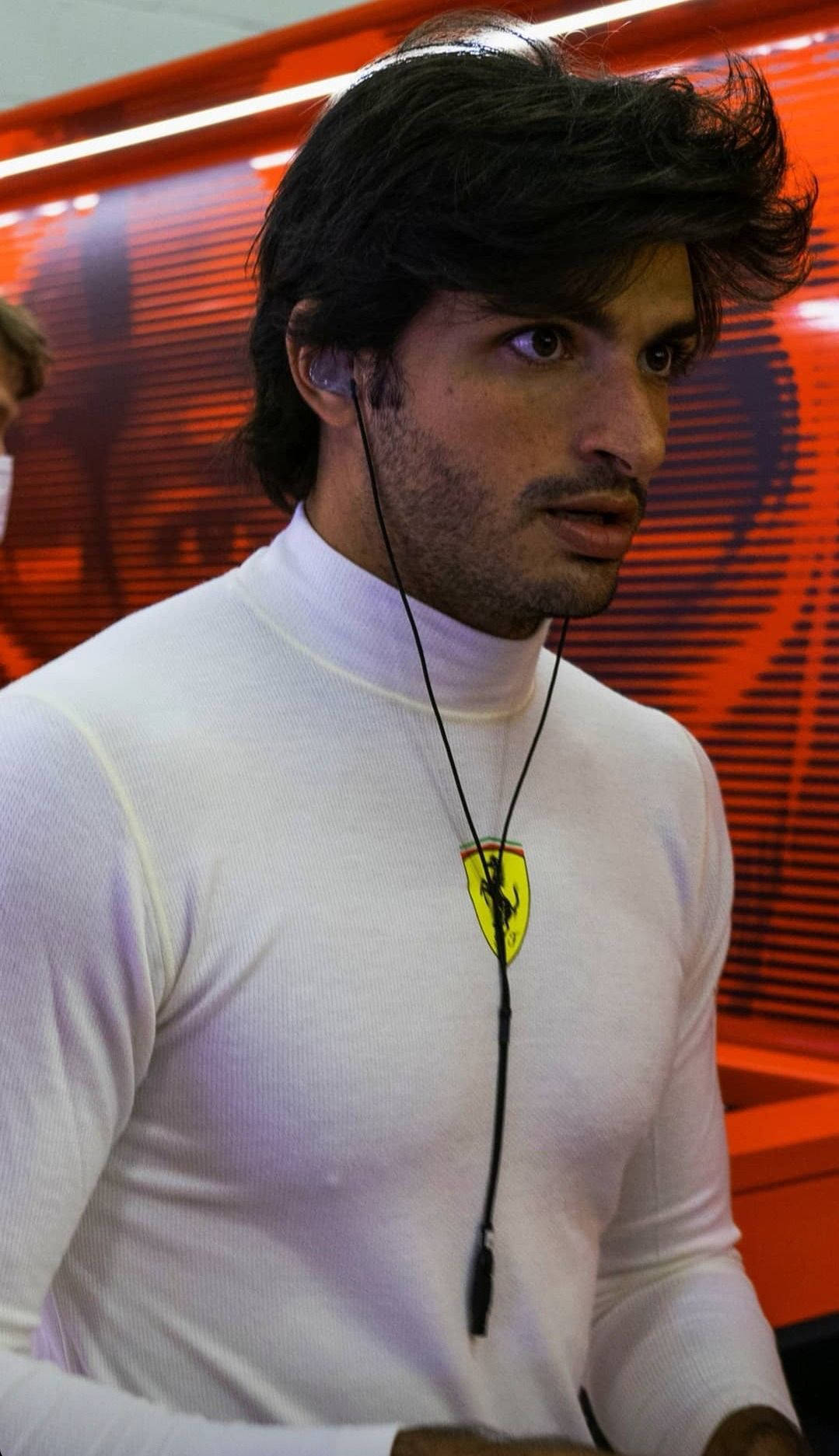 Carlos Sainz Jr Wearing Earphones Background