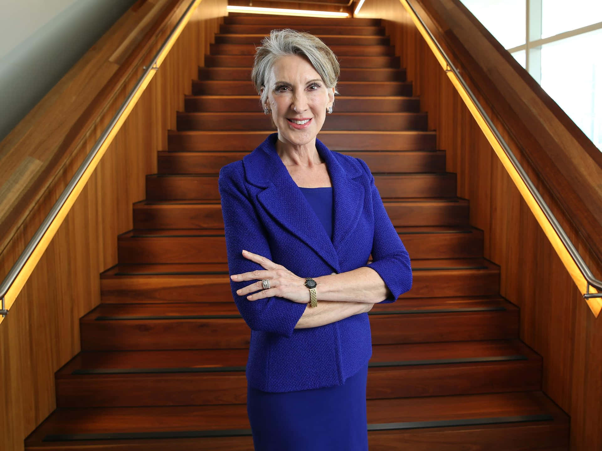 Carly Fiorina Poses Elegantly In Front Of Staircase