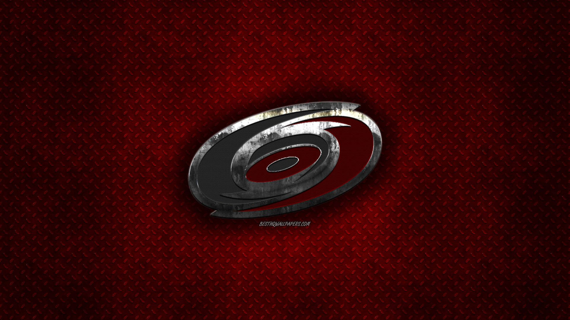 Carolina Hurricanes Logo On Metal Background
