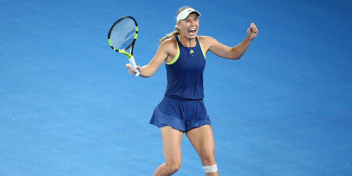 Caroline Wozniacki Winning On Blue Court Background