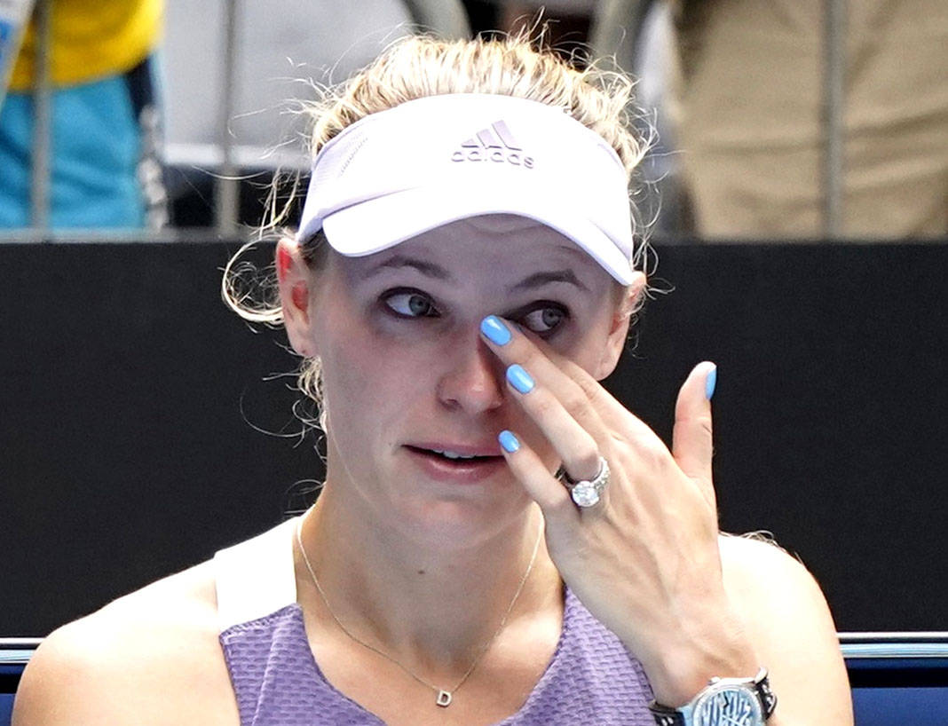 Caroline Wozniacki Wiping Tears Away Background